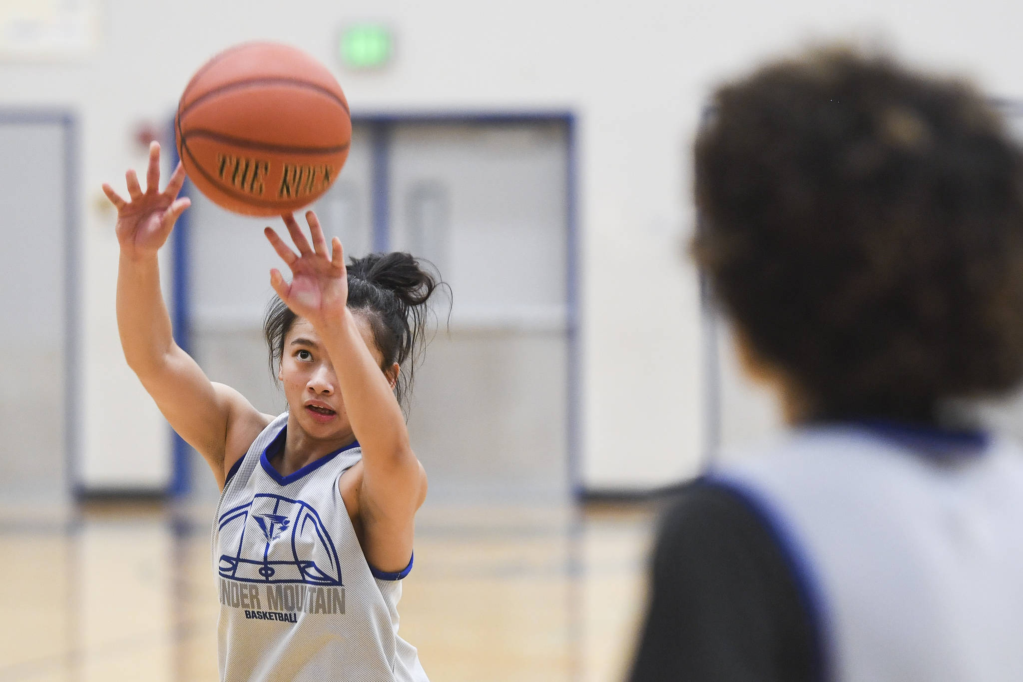 Mary Khaye Garcia shoots during the girls varsity basketball practice at Thunder Mountain High School on Monday, Dec. 9, 2019. (Michael Penn | Juneau Empire)
