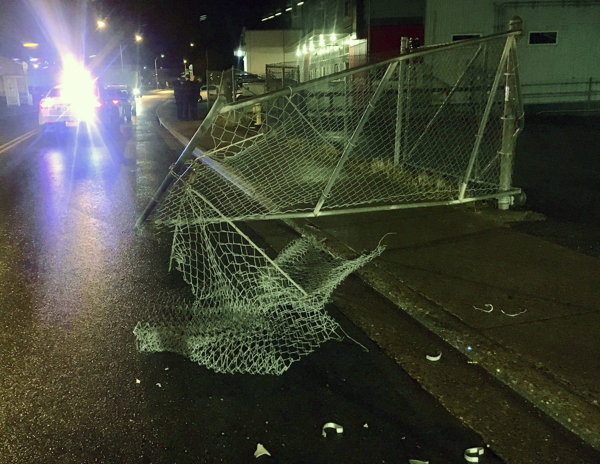 The fence in front of The Salvation Army Family Store on Willoughby Avenue was damaged by a drunken driver Wednesday night, police said. (Michael S. Lockett | Juneau Empire)