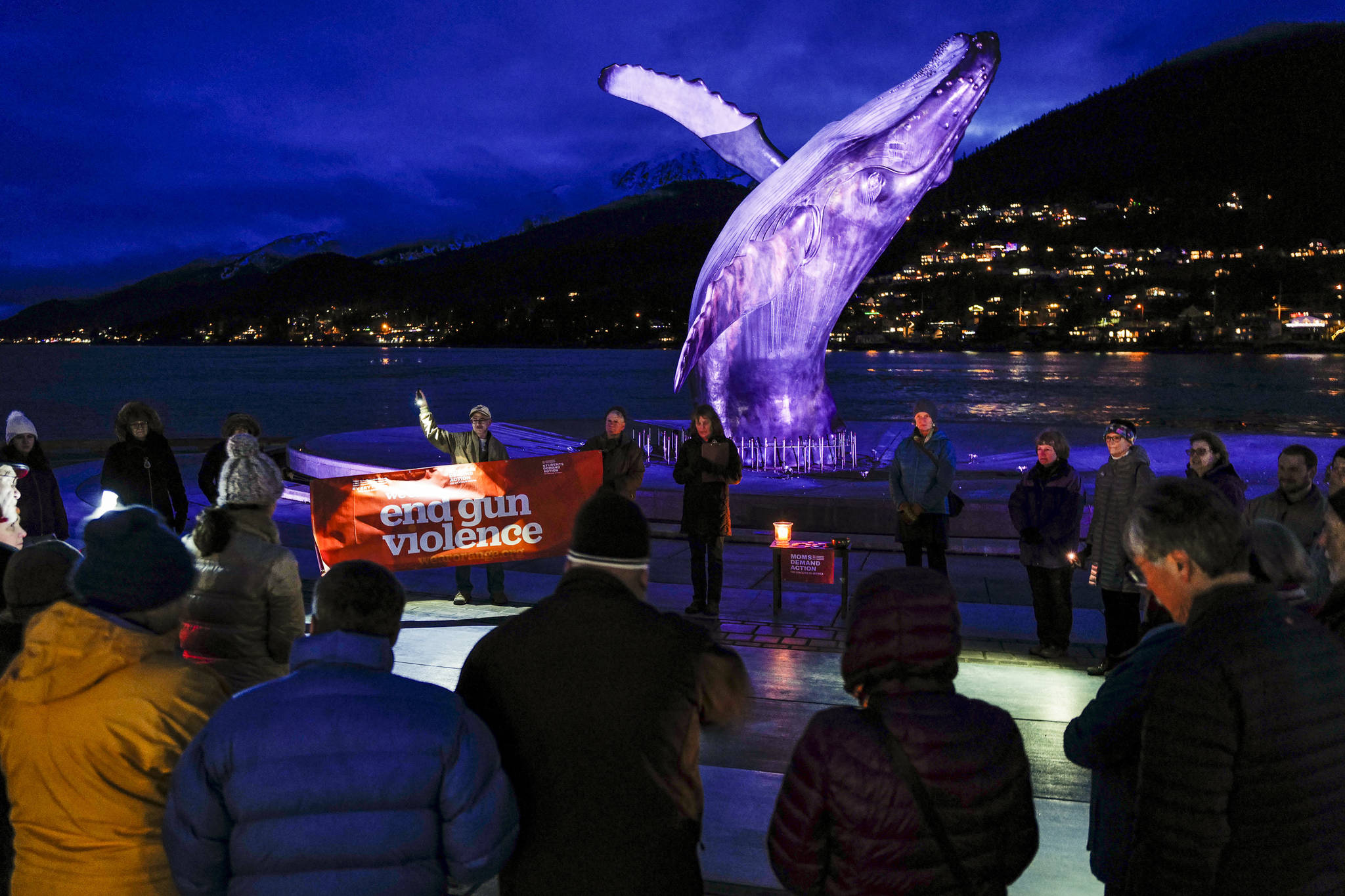 Juneau residents attend a vigil to end gun violence sponsored by Moms Demand Action at the Mayor Bill Overstreet Park on Saturday, Dec. 14, 2019. (Michael Penn | Juneau Empire)