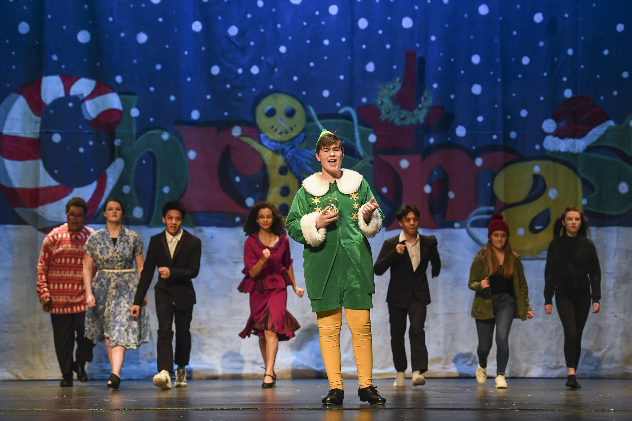 Toby Russell, stars as Buddy the Elf, during rehearsal of “Elf, the Musicial” at Juneau-Douglas High School: Yadaa.at Kalé on Friday, Dec. 13, 2019. (Michael Penn | Juneau Empire)