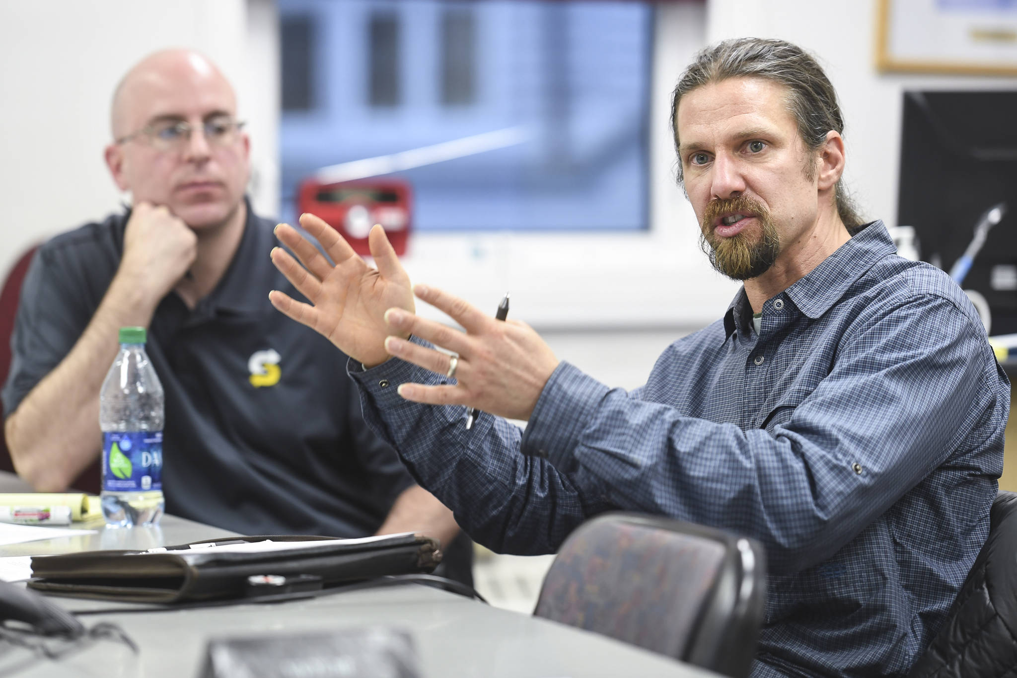 Eaglecrest Ski Area General Manager Dave Scanlan, right, speaks during a task force meeting at City Hall looking into summer activities at the city-owned ski resort on Thursday, Dec. 19, 2019. (Michael Penn | Juneau Empire)