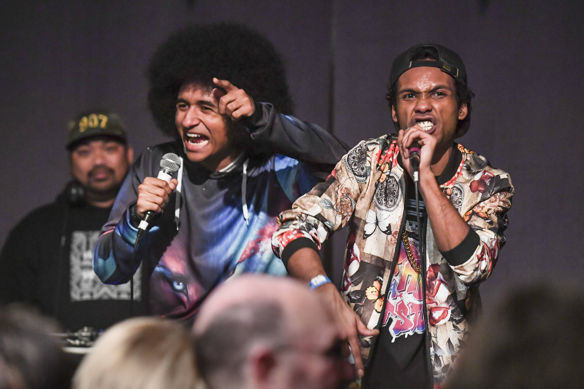 Arias Hoyle, left, and Chris Talley perform during the Killah Priest of Wu Tang Southeast Tour at the Juneau Arts & Culture Center on Friday, Dec. 20, 2019. (Michael Penn | Juneau Empire)