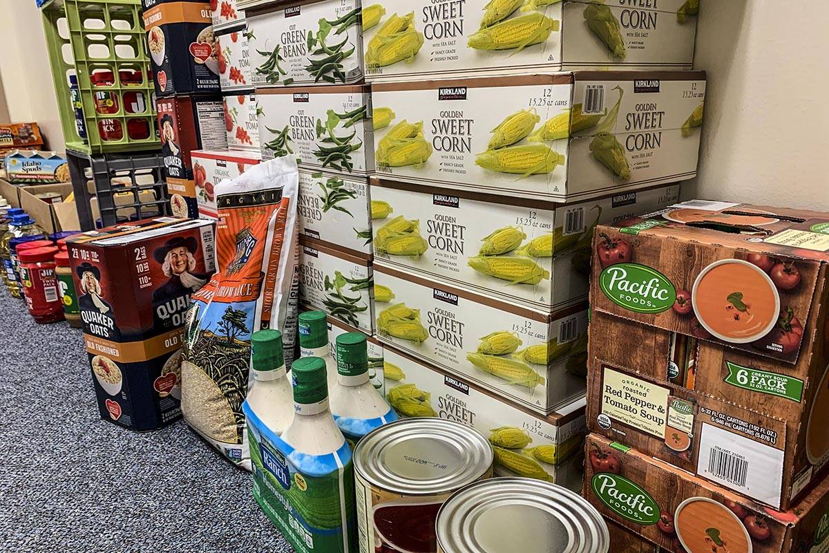 Workers at the Department of Law in Juneau donated more than $2,000 and more than 1,000 pounds of food to charities this year. (Courtesy photo | Department of Law)