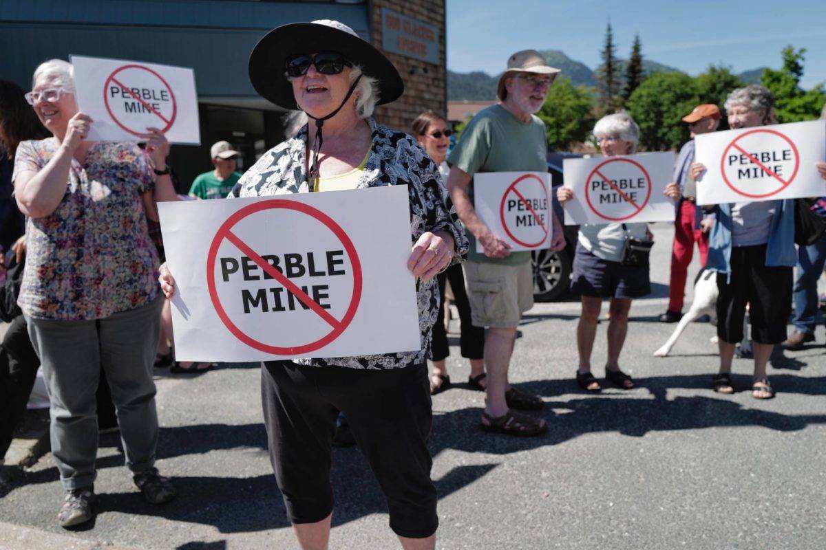 In this file photo from June 25, 2019, Judy Cavanaugh stands with others at a rally against the Pebble Mine in front of U.S. Sen. Lisa Murkowski’s Juneau office. (Michael Penn | Juneau Empire File)