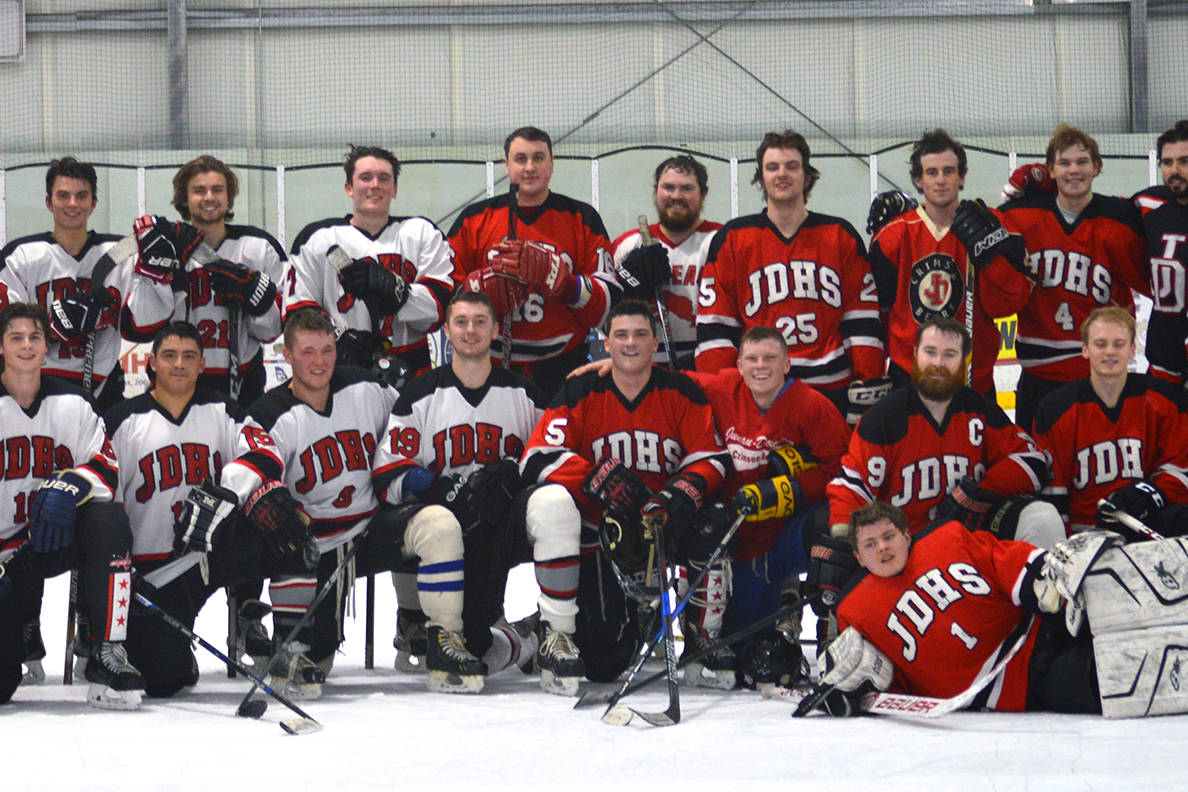 Photo: JDHS hockey alums square off