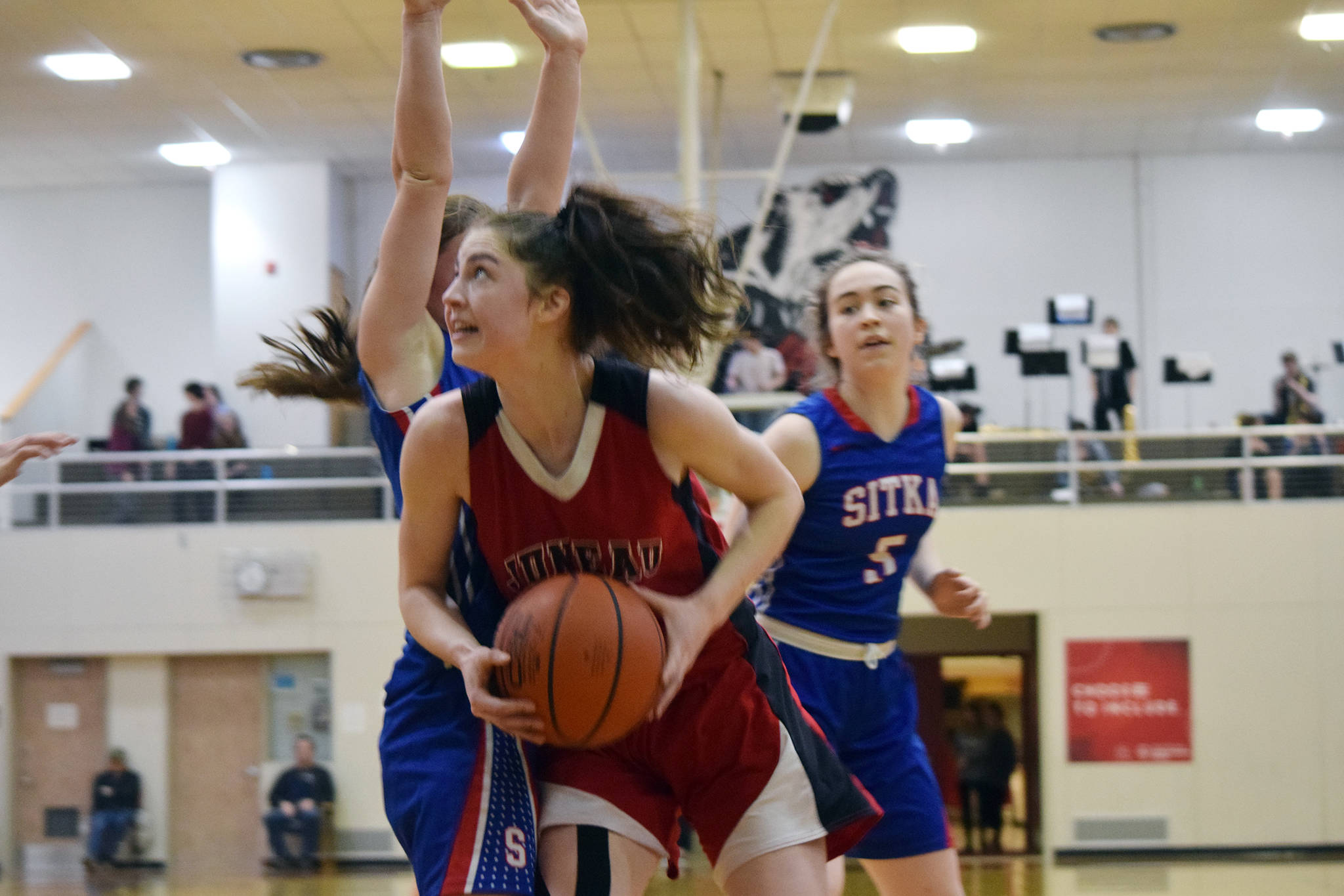 Juneau-Douglas High School: Yadaat.at Kale’s Kendyl Carson gets around a Sitka defender in the fourth quarter in the Princess Cruises Capital City Classic at JDHS on Monday, Dec. 30, 2019. (Nolin Ainsworth | Juneau Empire)
