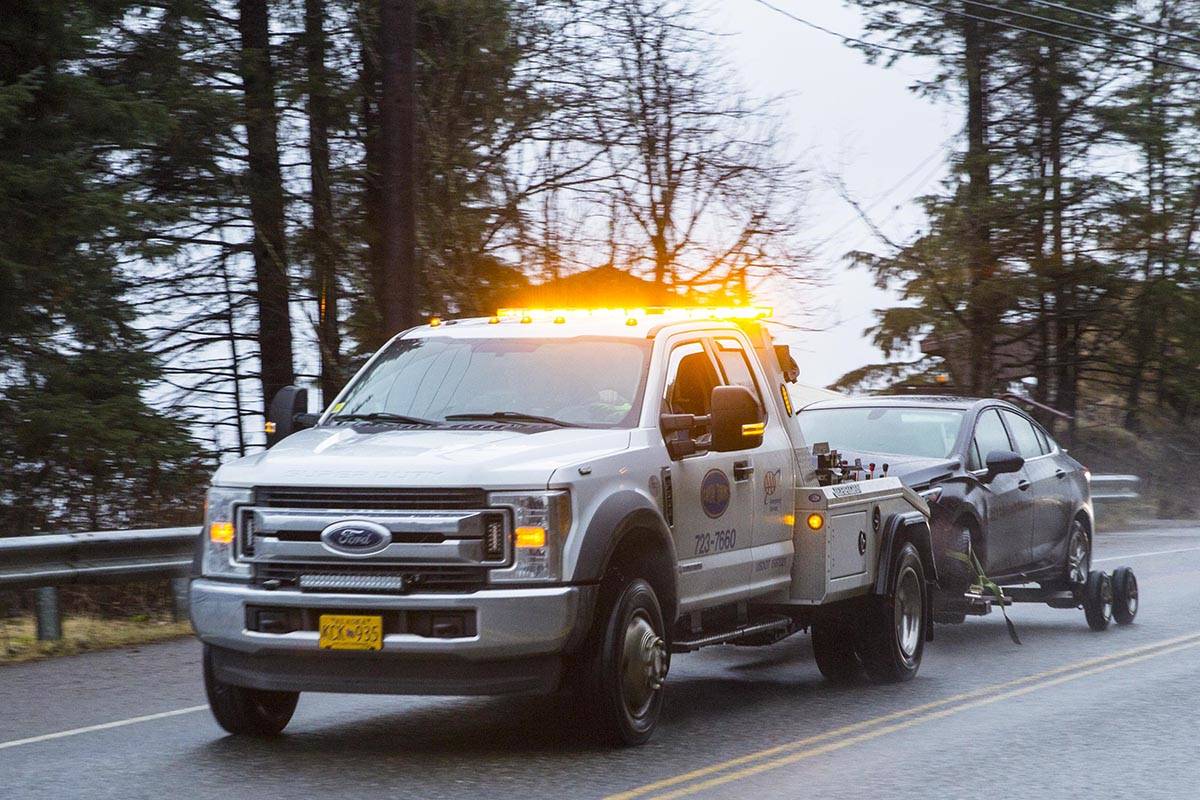 Two cars were involved in a wreck near the Auke Bay Ferry Terminal, totaling both vehicles, on Dec. 31, 2019. (Michael S. Lockett | Juneau Empire)
