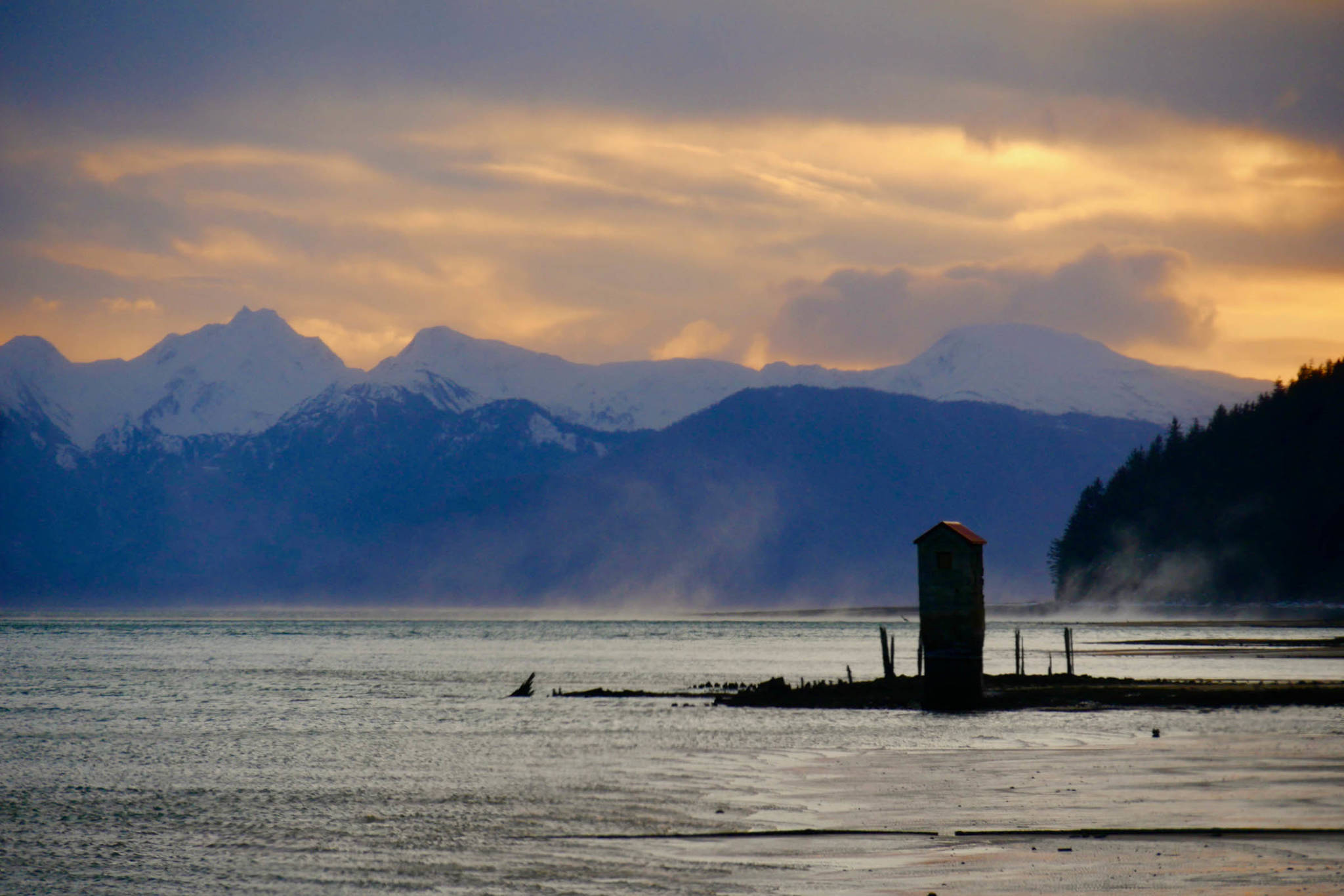 High winds whip around the pumphouse at Sandy Beach on Thursday.
