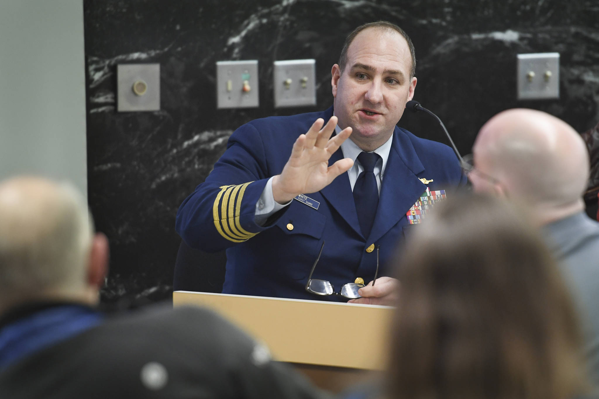 Capt. Steve White, from U.S. Coast Guard Sector Juneau, gives a presentation to the Visitor Industry Task Force in the Assembly chambers on Tuesday, Jan. 7, 2020. (Michael Penn | Juneau Empire)