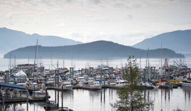 Coghlan Island is seen at the entrance of the Don D. Statter Harbor in Auke Bay in this file photo from 2014. (Michael Penn | Juneau Empire File)