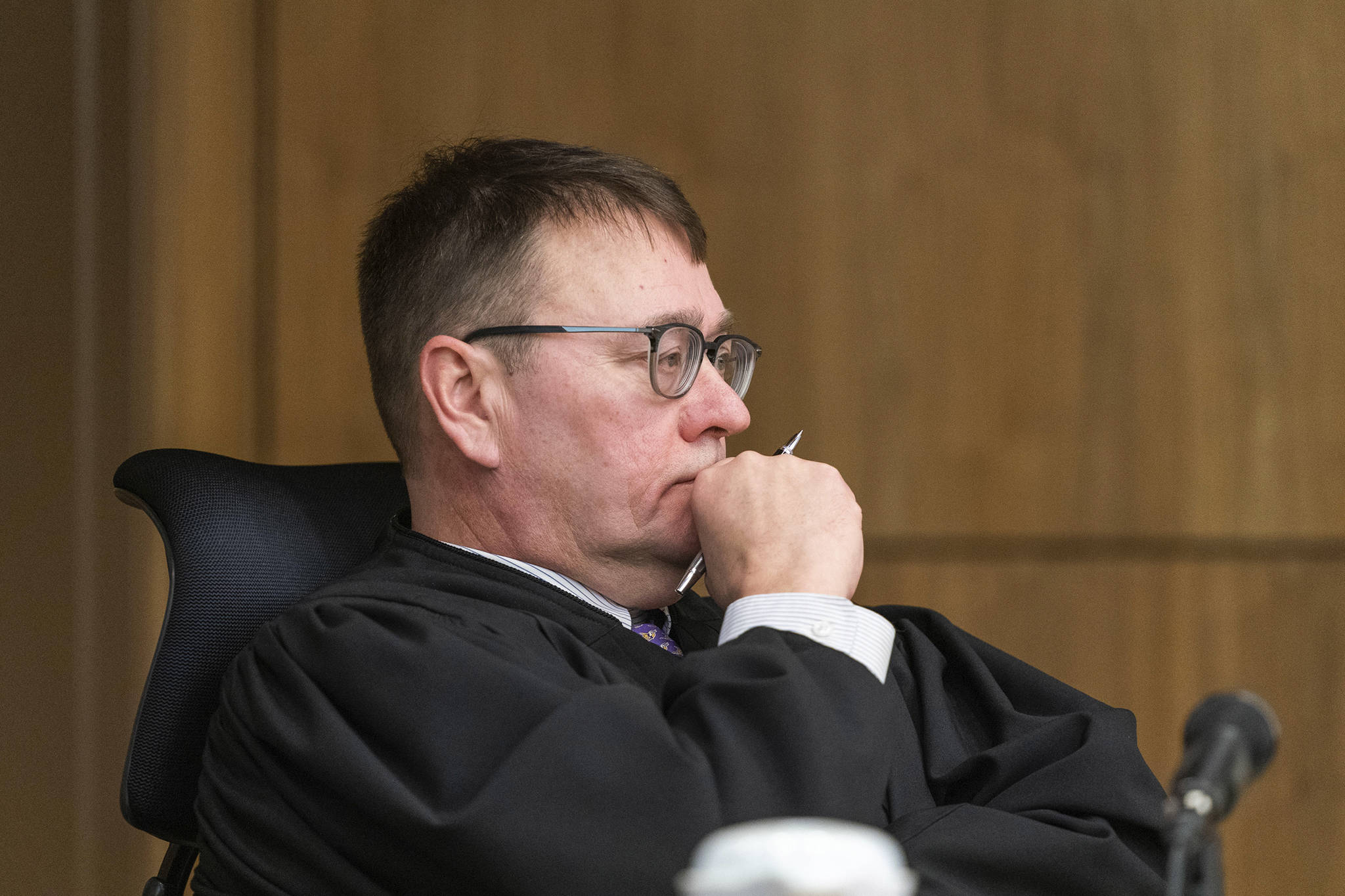 Superior Court Judge Eric Aarseth listens to arguments over an effort to recall Gov. Mike Dunleavy Friday in Anchorage. (Loren Holmes | Anchorage Daily News via AP)