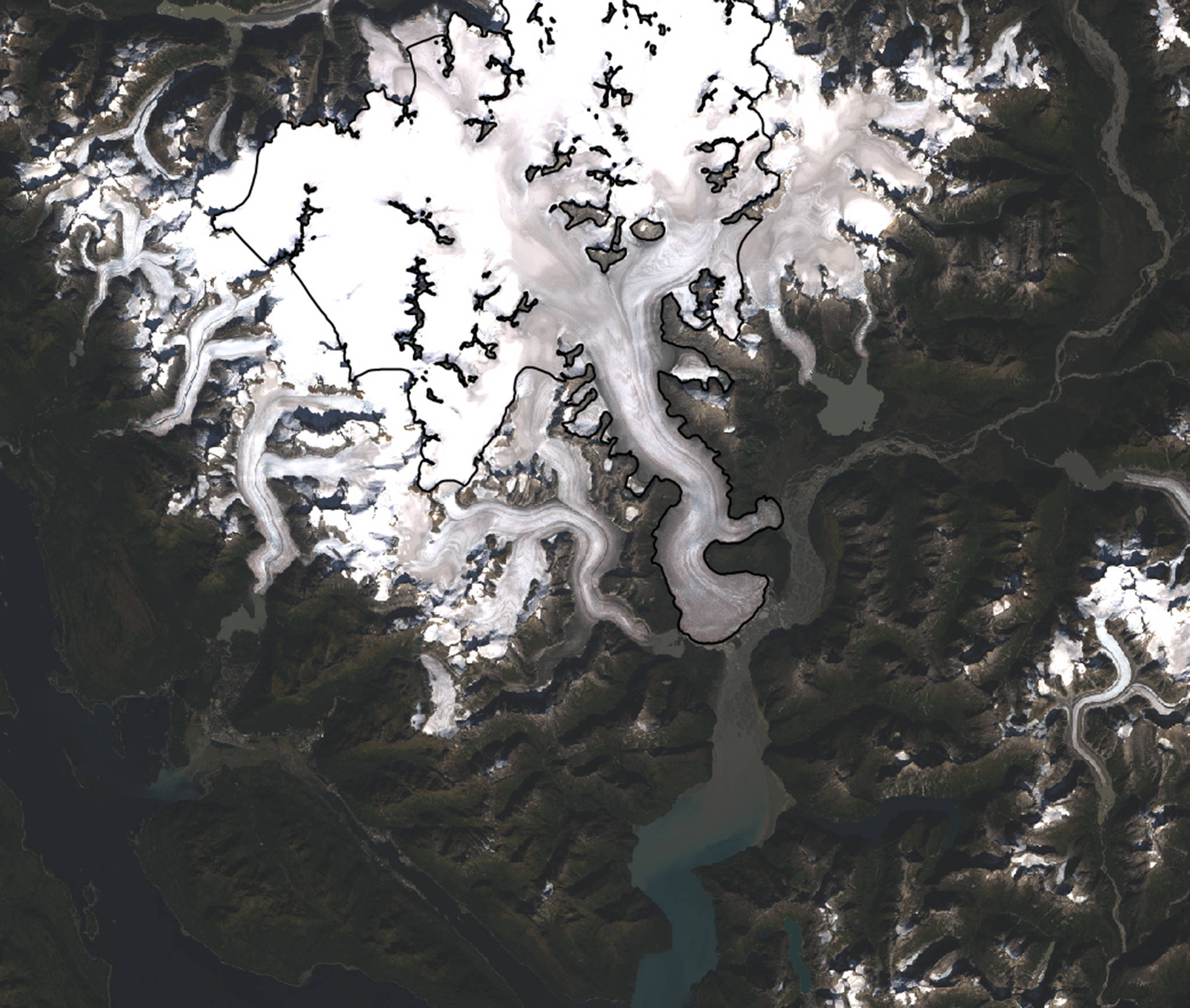 This Landsat image shows the outline of Taku Glacier within the Juneau Icefield. Taku Glacier was advancing for more than 200 years, but it now appears to be retreating. (Satellite Image)