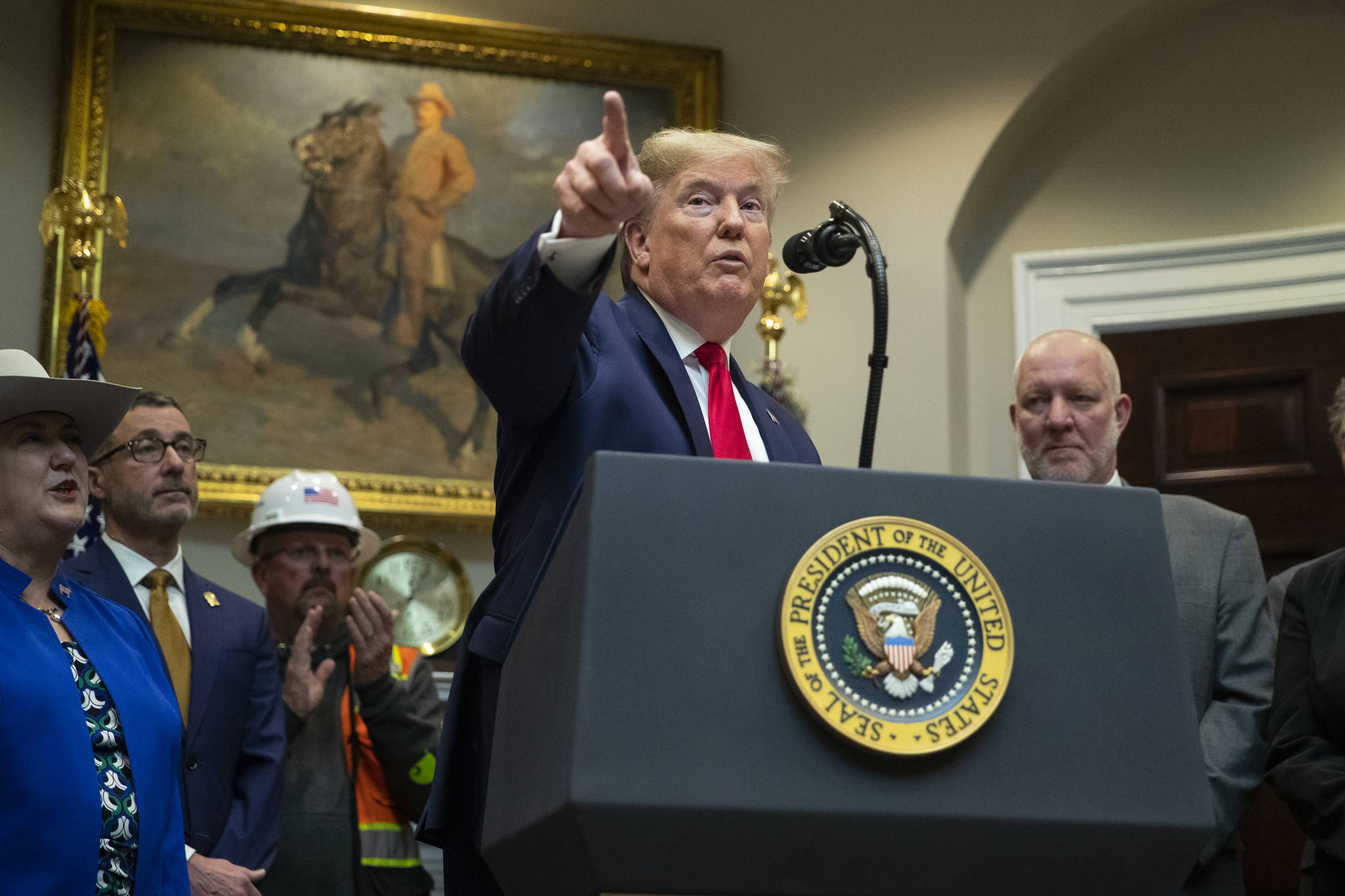 Evan Vucci / Associated Press                                President Donald Trump speaks Jan. 9 at the White House about proposed changes to the National Environmental Policy Act.