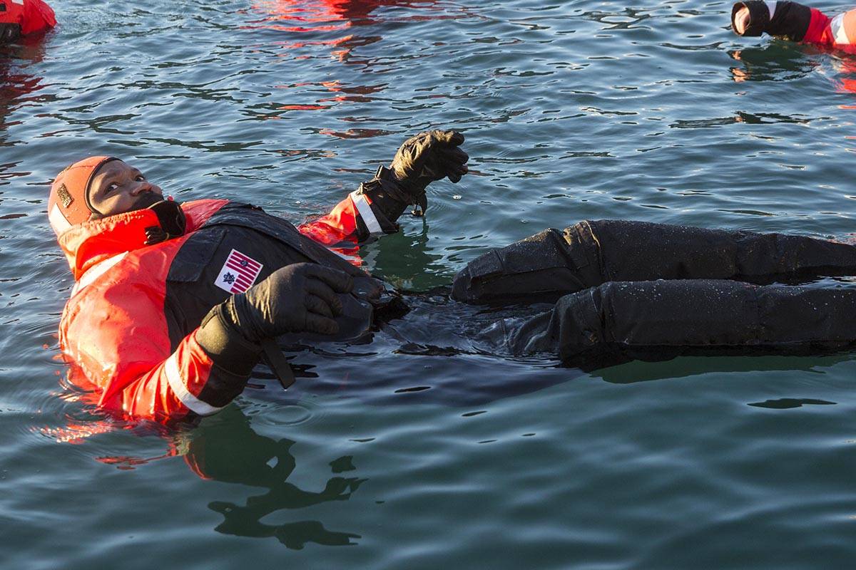 Petty Officer 2nd Class Steven Knight waits for their fifteen minute swim to be up during cold water survival training at Coast Guard Station Juneau, Jan. 13, 2020. (Michael S. Lockett | Juneau Empire)
