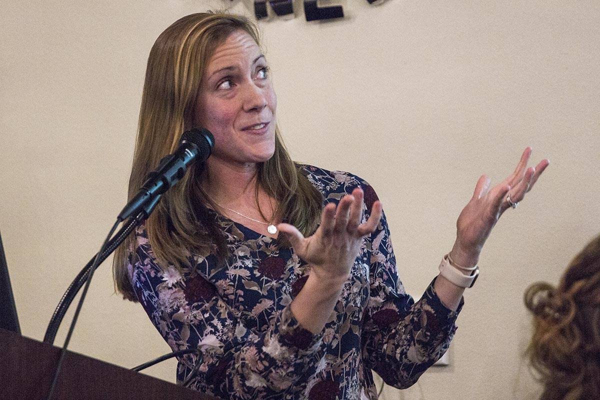 Ally Schuler speaks to members of the Juneau Chamber of Commerce about whale watching tours during a luncheon Jan. 16.