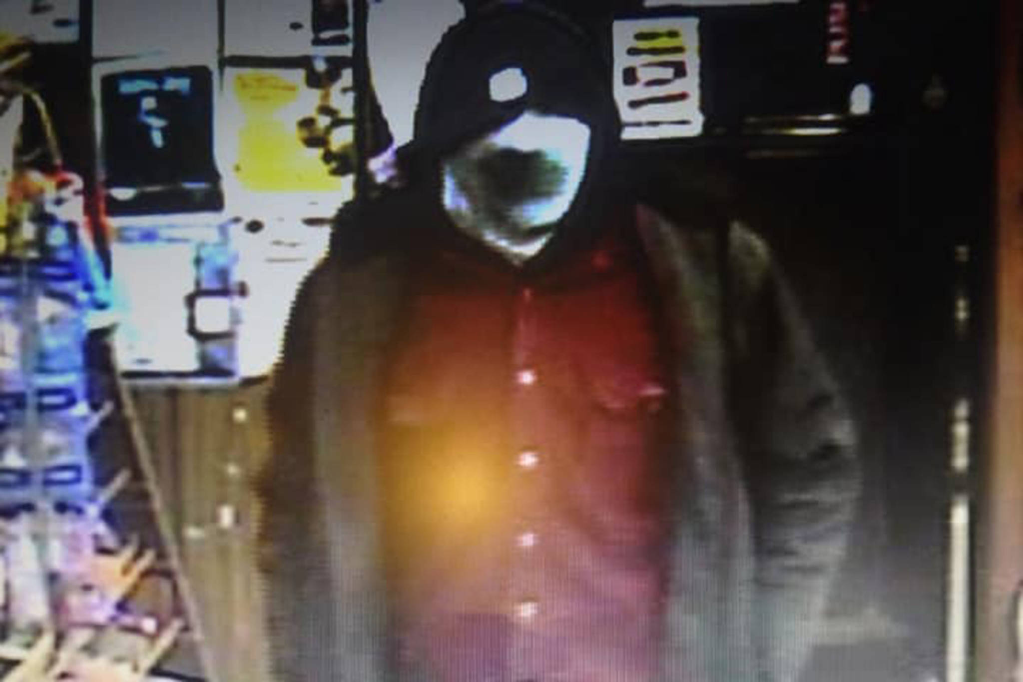 Juneau Police Department wants information about a man who allegedly robbed a liquor store Friday night. (Courtesy Photo | Juneau Police Department)