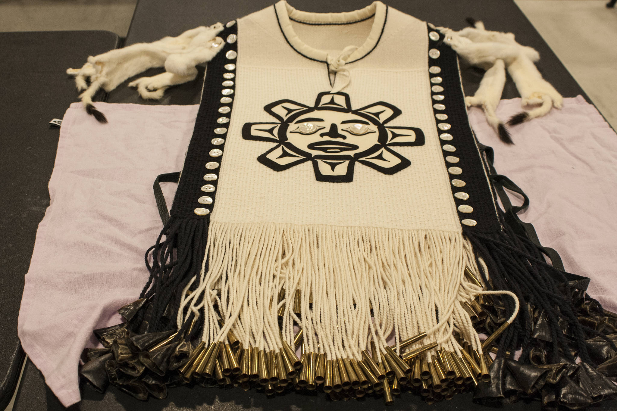 Kay Field Parker said this tunic took about eight months of 20-hour work weeks to complete. It will be danced at the upcoming Gathering of the Robes. (Ben Hohenstatt | Capital City Weekly)