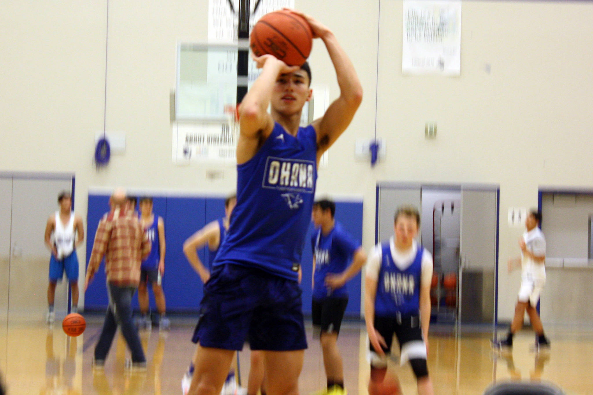 Ben Hohenstatt | Juneau Empire                                 Thunder Mountain High School point guard Bryson Echiverri hoists a shot at practice Jan. 22.