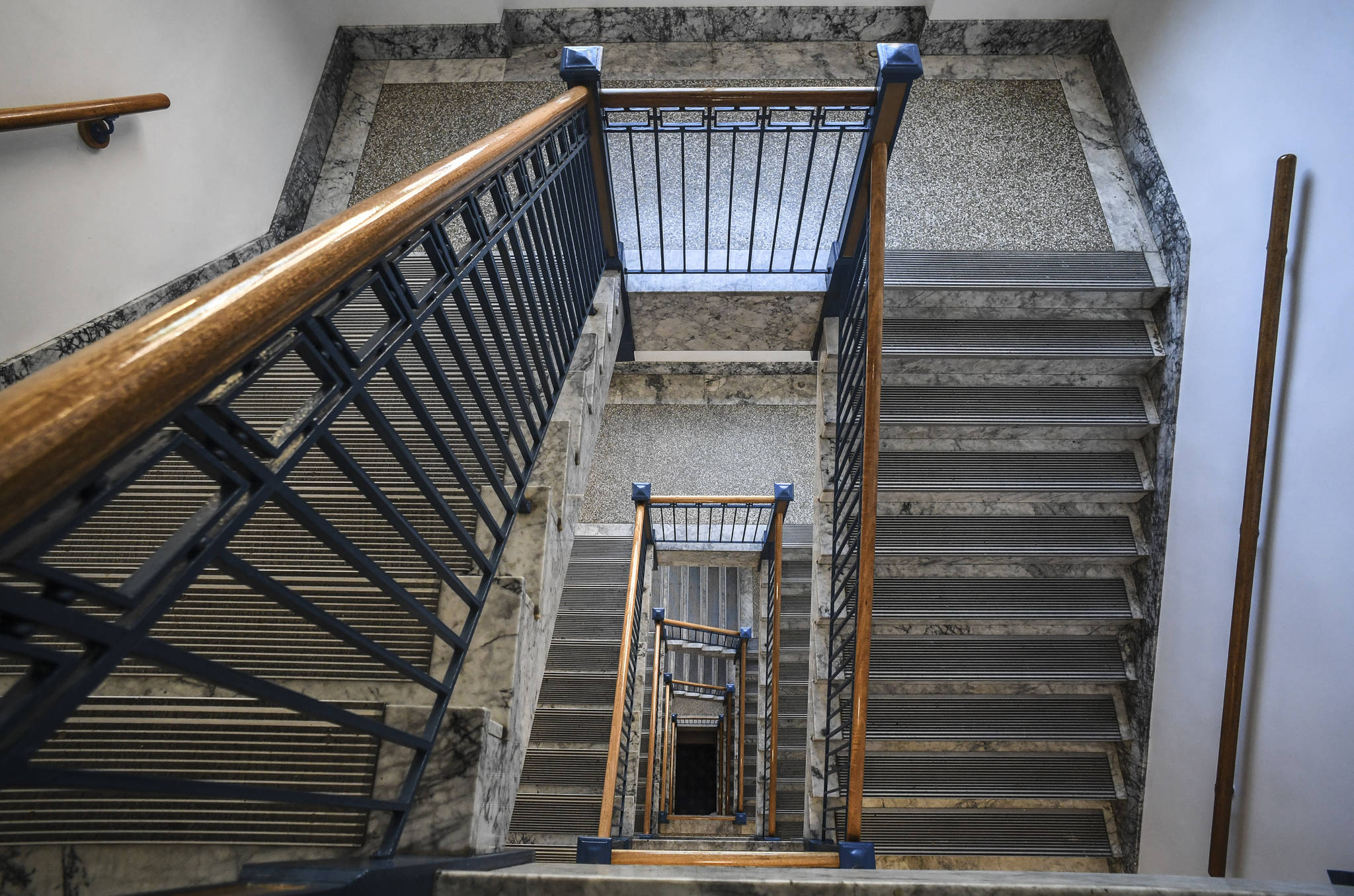 The stairwell at the Alaska State Capitol is void of people on Tuesday, Aug. 6, 2019. (Michael Penn | Juneau Empire File)