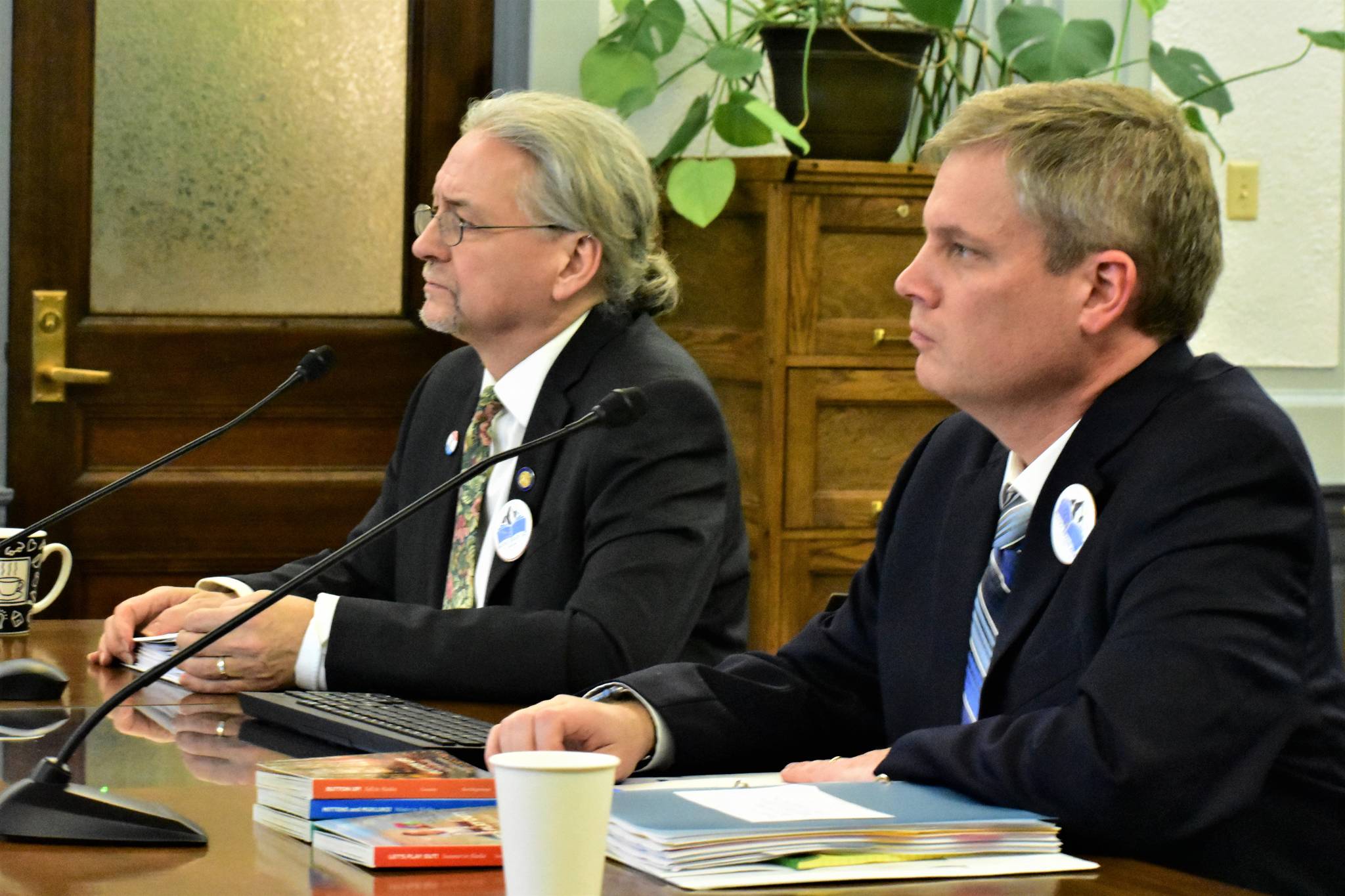 Sen. Tom Begich, D-Anchorage, left, and Education Commissioner Michael Johnson answer questions about the Alaska Reads Act at a Senate Education Committee meeting on Thursday. (Peter Segall | Juneau Empire)