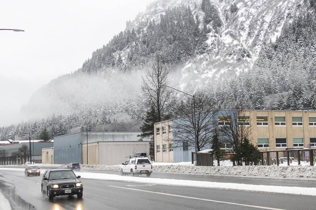 Michael S. Lockett | Juneau Empire                                 Cars drive past Harris Harbor on Jan. 22, 2020.