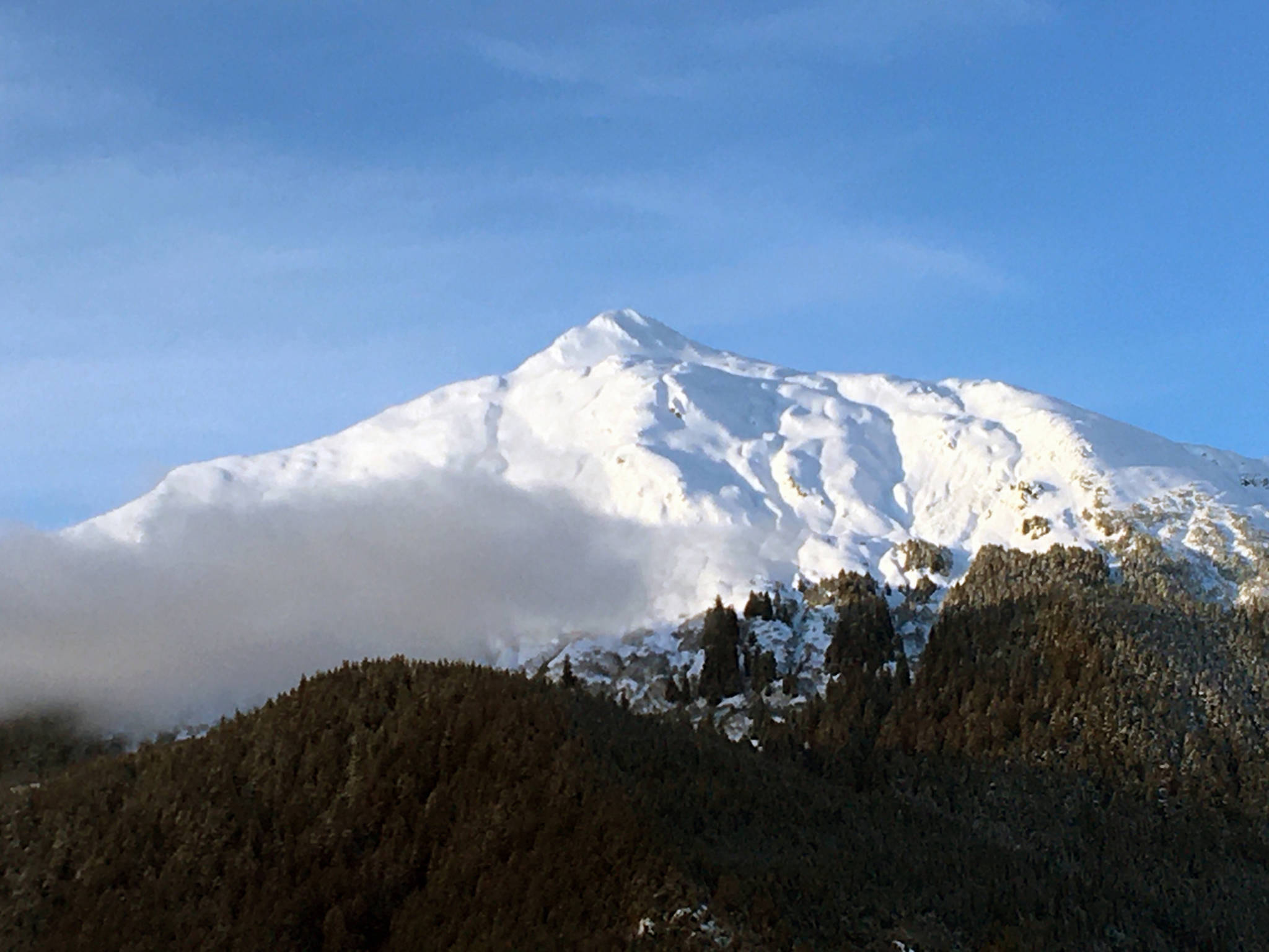 Mount McGinnis glows in the afternoon light on Jan. 4. (Courtesy photo | Denise Carroll)