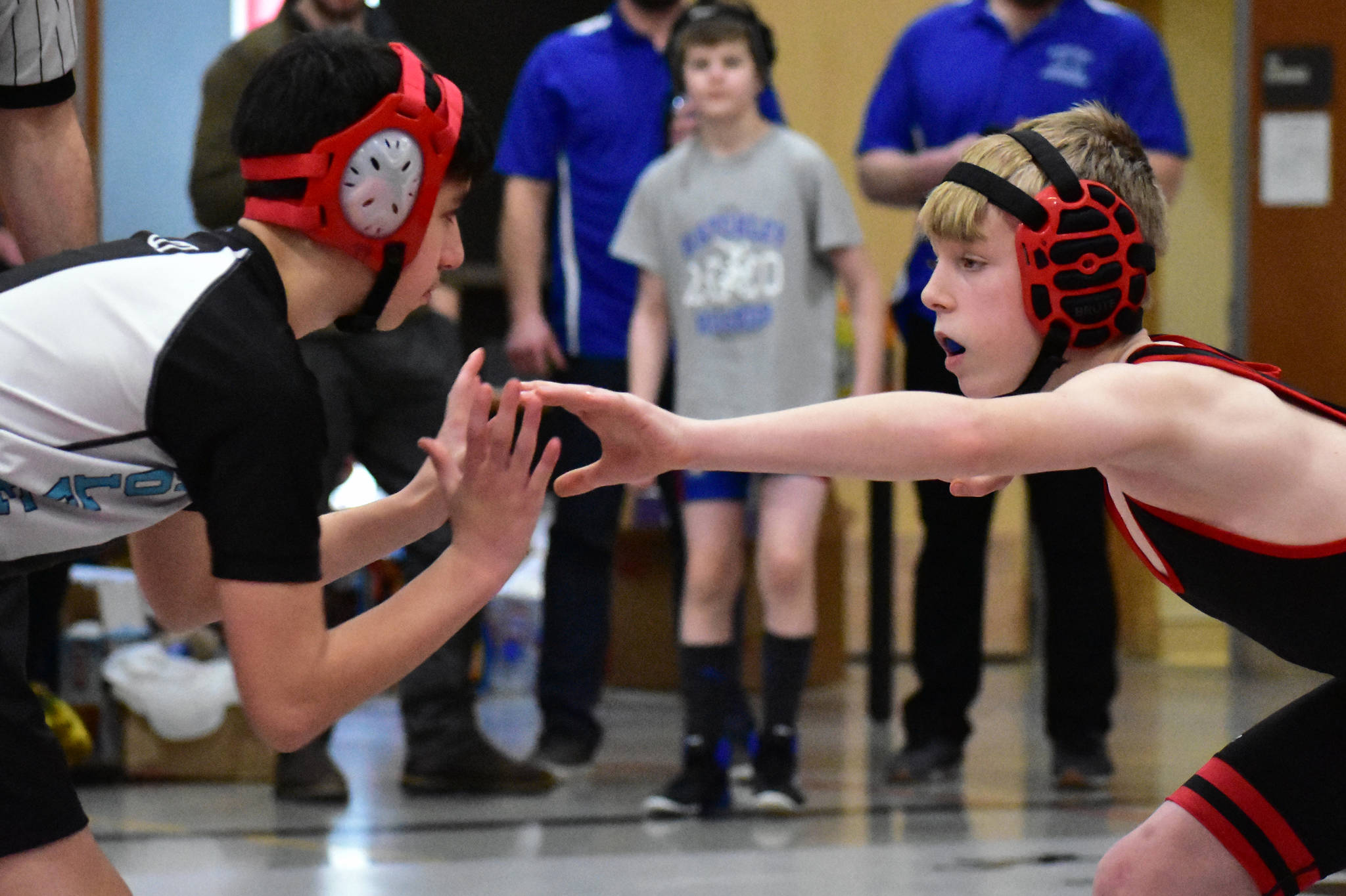 Two students face off for a match at the 2020 Southeast Alaska Middle School Wrestling Championship at Floyd Dryden Middle School on Friday. (Peter Segall | Juneau Empire)