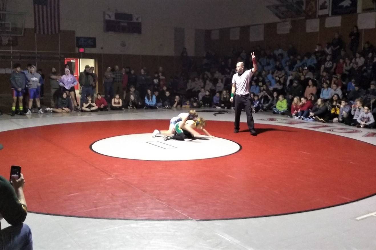 During the final matches of the tournament, lights are turned down in the gym at Floyd Dryden Middle School for the Southeast Alaska Middle School Wrestling Tournament on Saturday, Feb. 15, 2020. (Courtesy photo | Ken Brown)