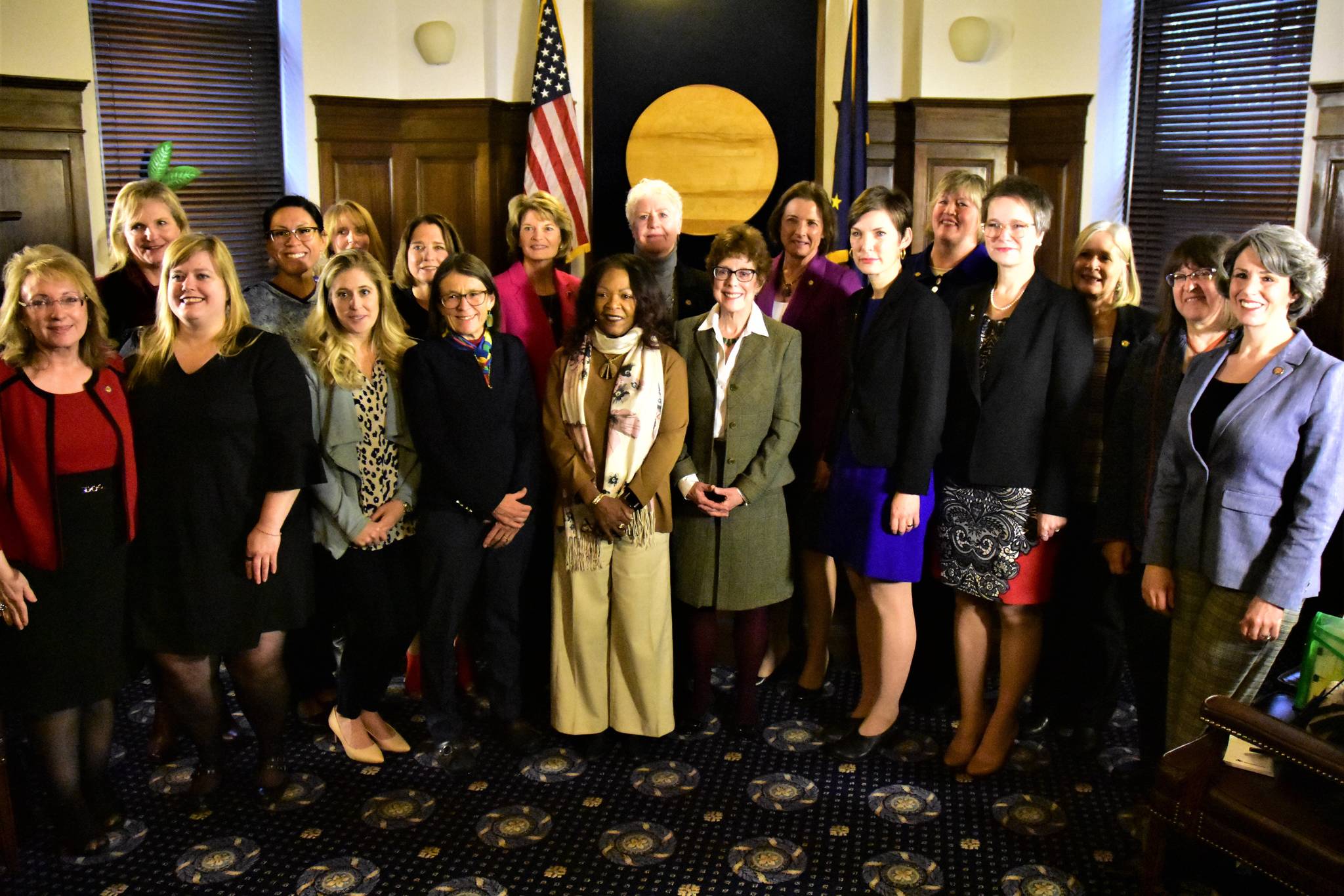 All the female members of the Alaska State Legislature with Sen. Lisa Murkowski, R-Alaska, in the House Speaker’s Chambers at the Alaska Capitol on Tuesday. (Peter Segall | Juneau Empire)