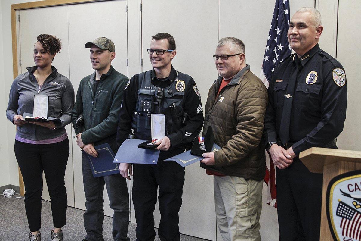 Several citizens and officers of the Juneau Police Department were awarded for outstanding bravery, livesaving skills, or excellence of service at the JPD station on Tuesday. (Michael S. Lockett | Juneau Empire)
