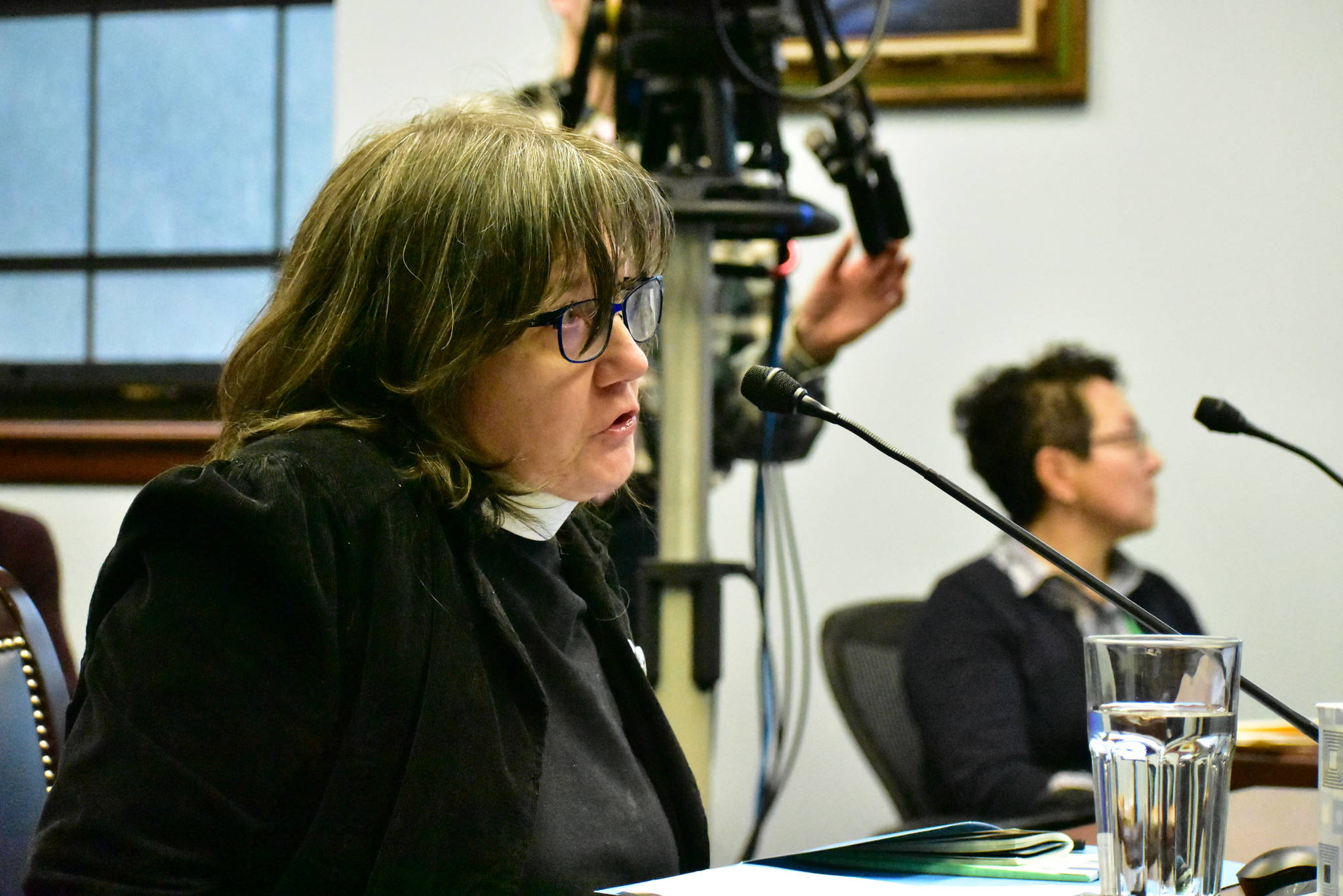 Rev. Caroline Malseed, priest-in-charge at St. Brendan’s Episcopal Church in Juneau give testimony against SJR 13 on Wednesday, Feb. 26, 2020. (Peter Segall | Juneau Empire)
