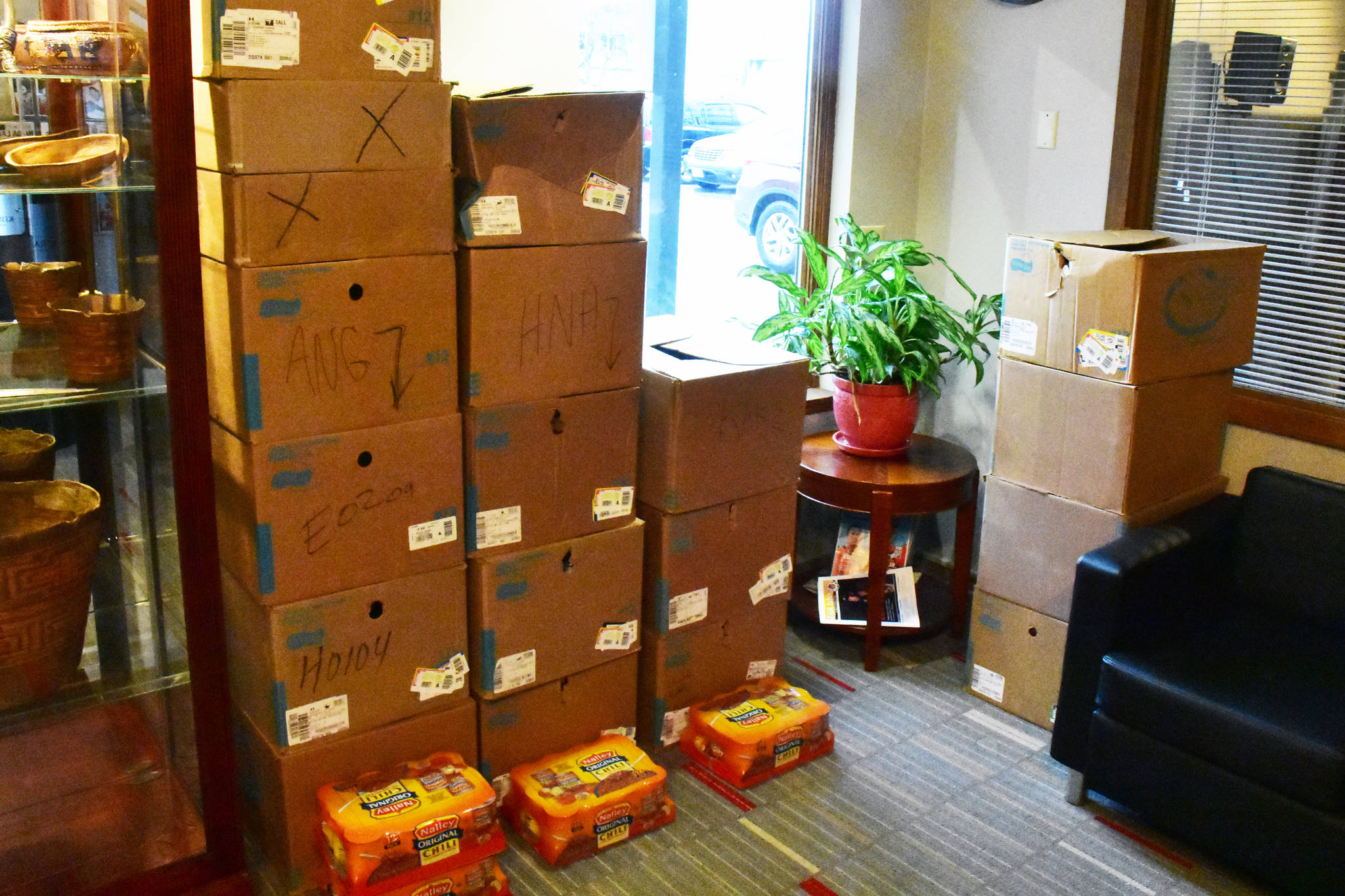Donated food in the offices of Central Council of Tlingit and Haida Indian Tribes of Alaska on Thursday, Feb. 27, 2020. (Peter Segall | Juneau Empire)
