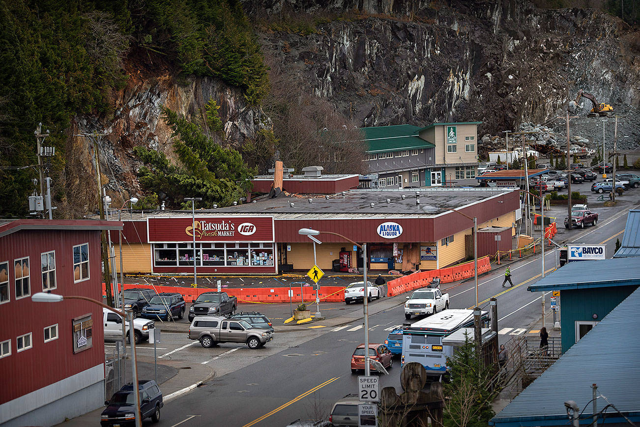 The Tatsuda’s IGA building in Ketchikan, Alaska was condemned Feb. 27, 2020, after it was struck early Thursday morning by a rockslide. The main portion of the slide hit the northeast corner of the building which collapsed part of the roof and ruptured a water main causing extensive damage to both the interior and exterior. (Dustin Safranek/Ketchikan Daily News via AP)