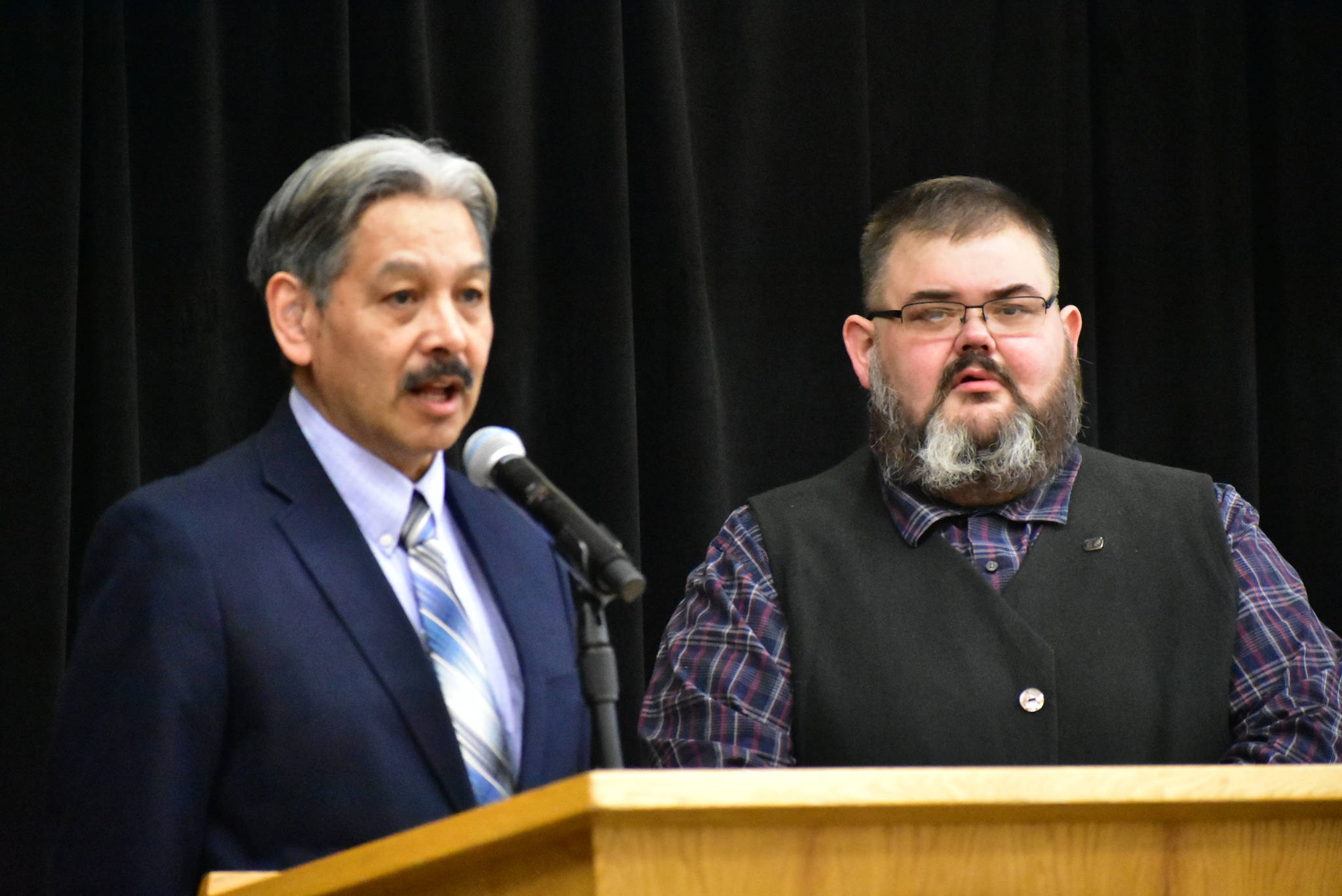 St. Paul Island Mayor Jacob Merculief, left speaks to the Native Issues Forum at Elizabeth Peratrovich Hall with Central Council of the Tlingit and Haida Indian Tribes of Alaska President Richard Chalyee Éesh Peterson on Monday, Mar. 2, 2020. (Peter Segall | Juneau Empire)