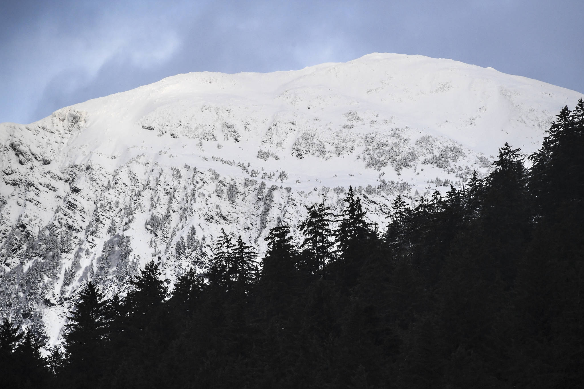 Fresh snow coats Heintzleman Ridge as seen from Twin Lakes in December 2019. Snow is an insulator for wildlife. (Michael Penn | Juneau Empire File)