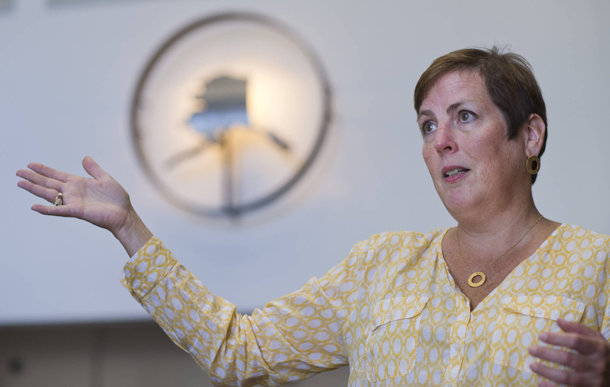 Angela Rodell, Executive Director of the Alaska Permanent Fund Corporation, speaks about the positive results of the fund this year at the APFC office in July 2018. (Michael Penn | Juneau Empire File)