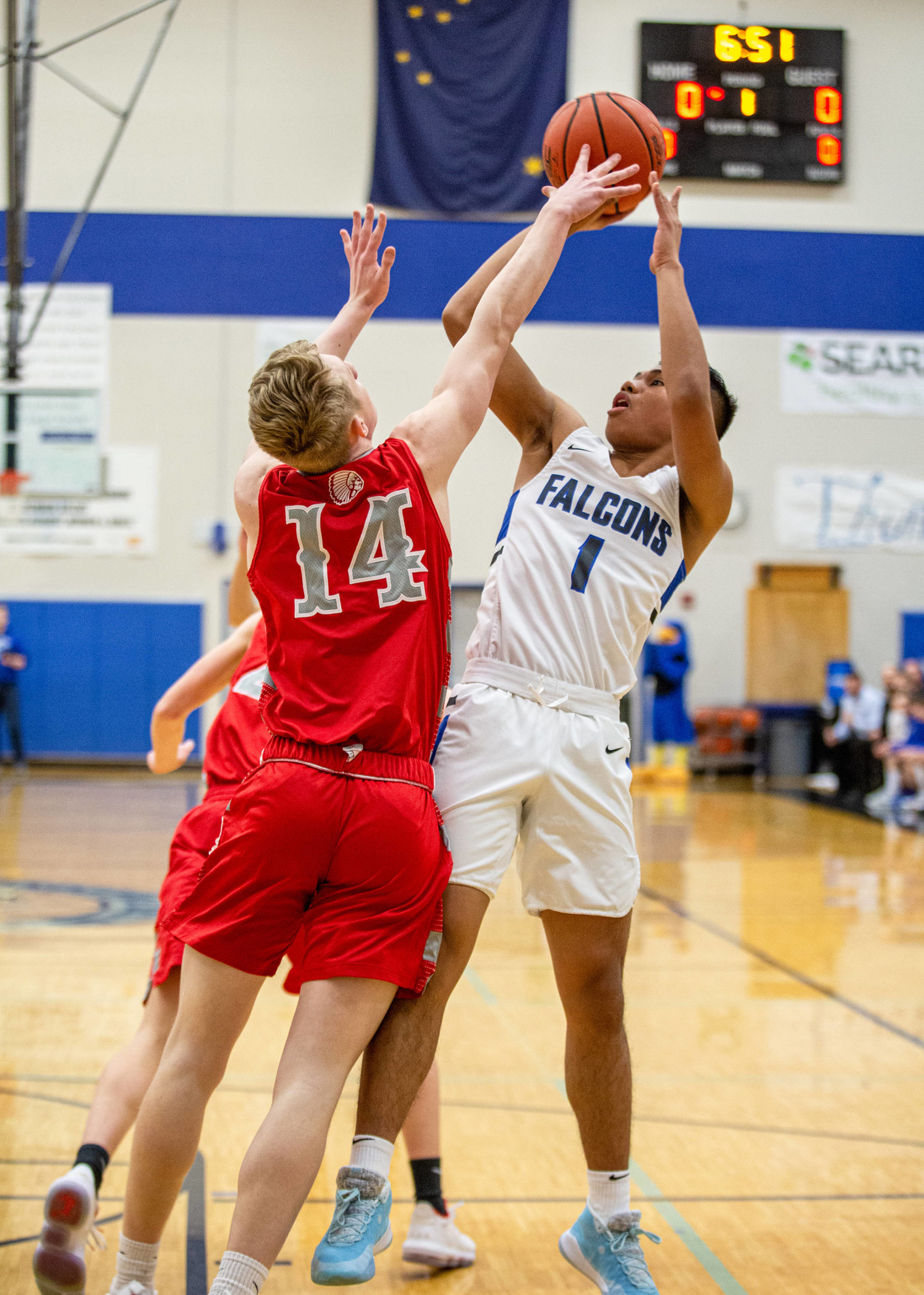 Thunder Mountain High School senior Brady Carandang shoots the shot that scored his 1,000th and 1,001st points Saturday, Feb. 29, 2020. (Courtesy Photo | Heather Holt)