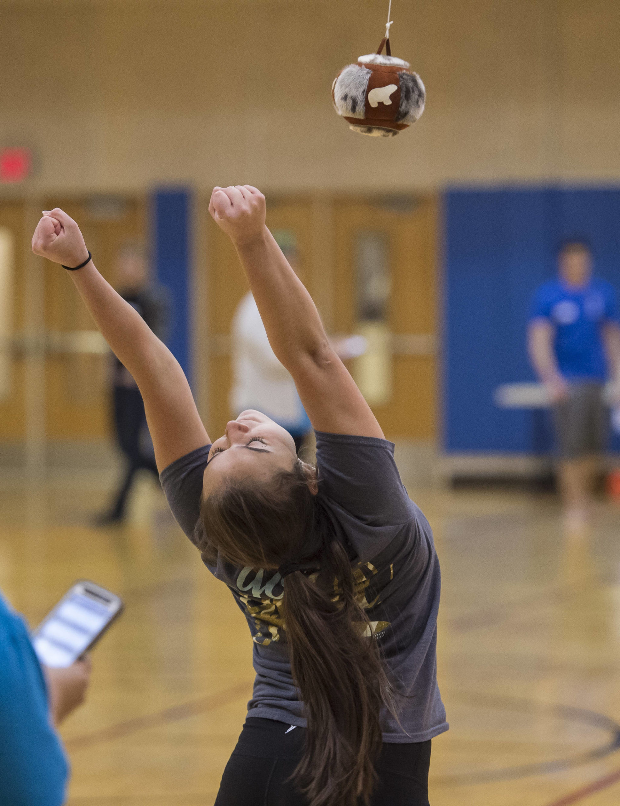 Michael Penn | Juneau Empire File                                Orion Denny, 16, rejoices in winning the high school adult one-foot high kick competition at the Native Youth Olympics 2018 Traditional Games at the University of Alaska Southeast Recreational Center in March 2018.