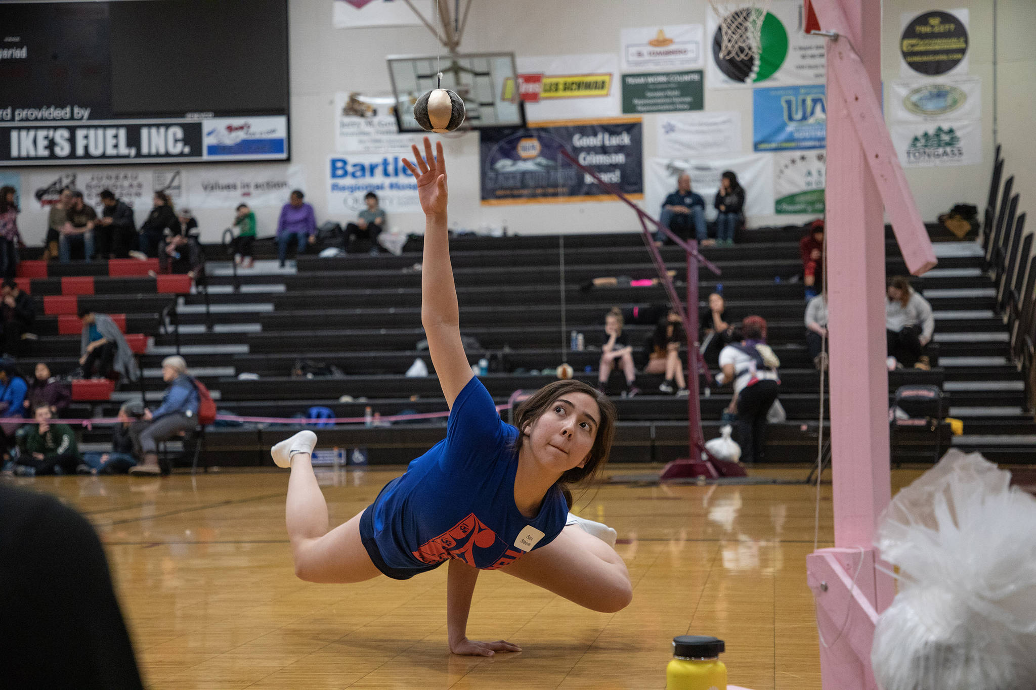 Sara Steeves competes in the one-hand reach at the 2020 Traditional Games held Saturday and Sunday at Juneau-Douglas High School: Yadaa.at Kalé. (Courtesy Photo | Lyndsey Brollini, courtesy of Sealaska Heritage Institute)