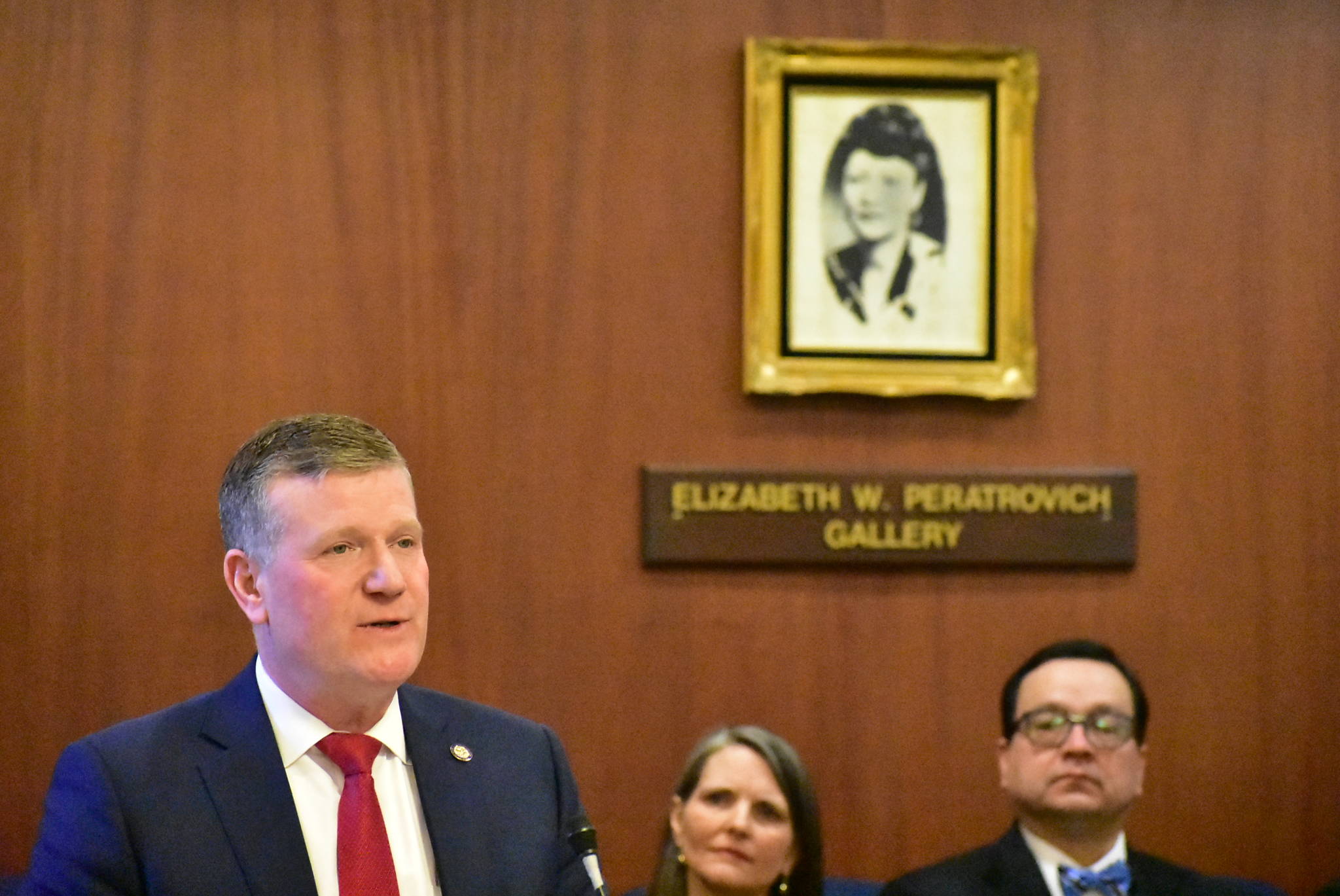 Rep. Chuck Kopp, R-Anchorage, speaks in support of his bill to recognize Alaska’s 229 already federally-recognized tribes on Friday, March 13, 2020. A photo of Alaska Native civil rights pioneer Elizabeth Peratrovich can be seen in the background. (Peter Segall | Juneau Empire)