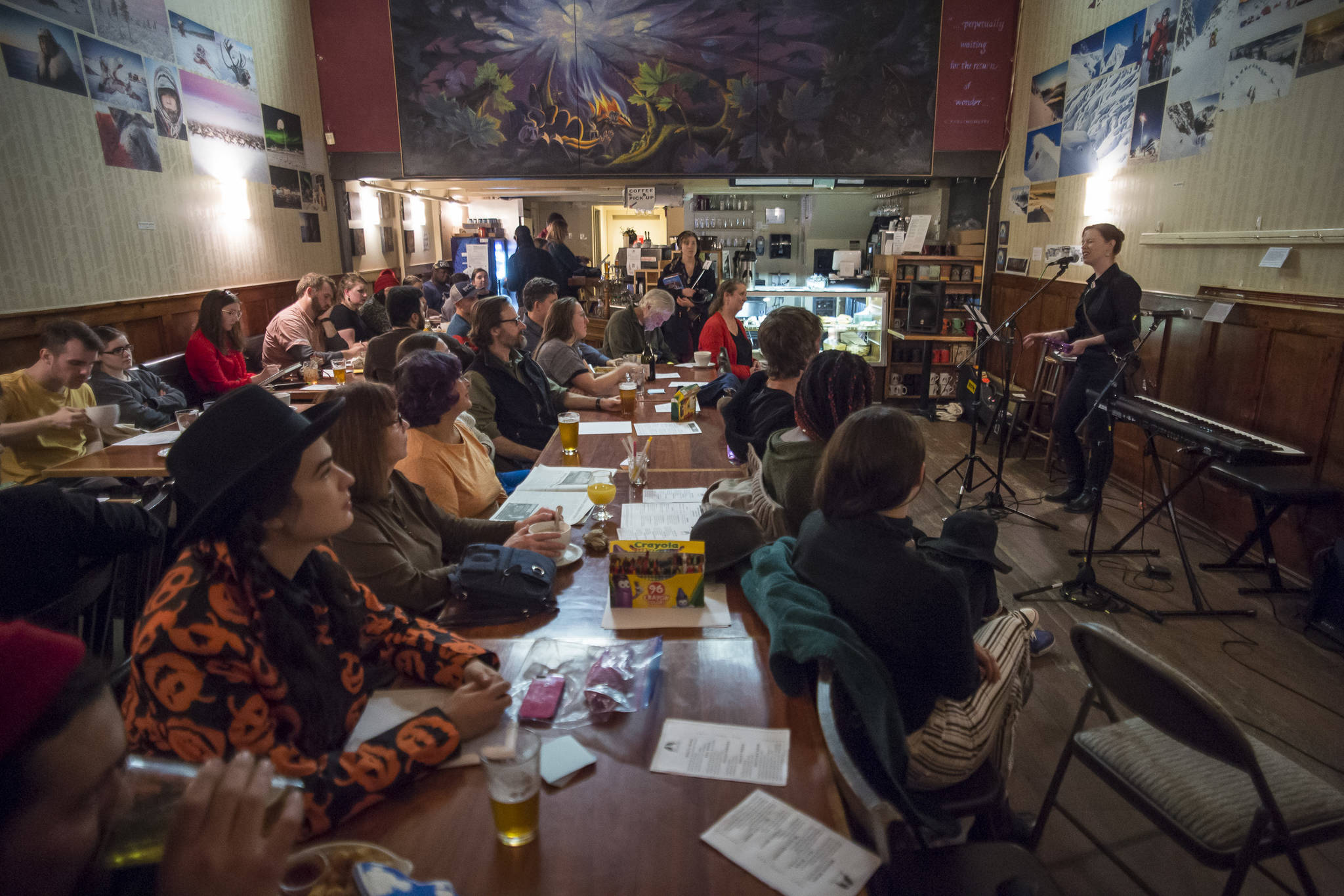 Event organizer and musician Marian Call sings a song to open the Mountainside Open Mic & Art Night at The Rookery in October 2018. The popular open mic series is becoming an online event in light of the COVID-19 pandemic. (Michael Penn | Juneau Empire File)