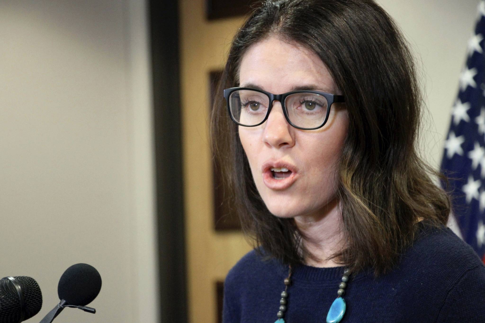 Dr. Anne Zink, the chief medical officer for the state of Alaska, addresses reporters at a news conference Monday, March 9, 2020, in Anchorage, Alaska. Zink told reporters there were nine confirmed COVID-19 cases in the state as of March 18, 2020. (AP Photo/Mark Thiessen)