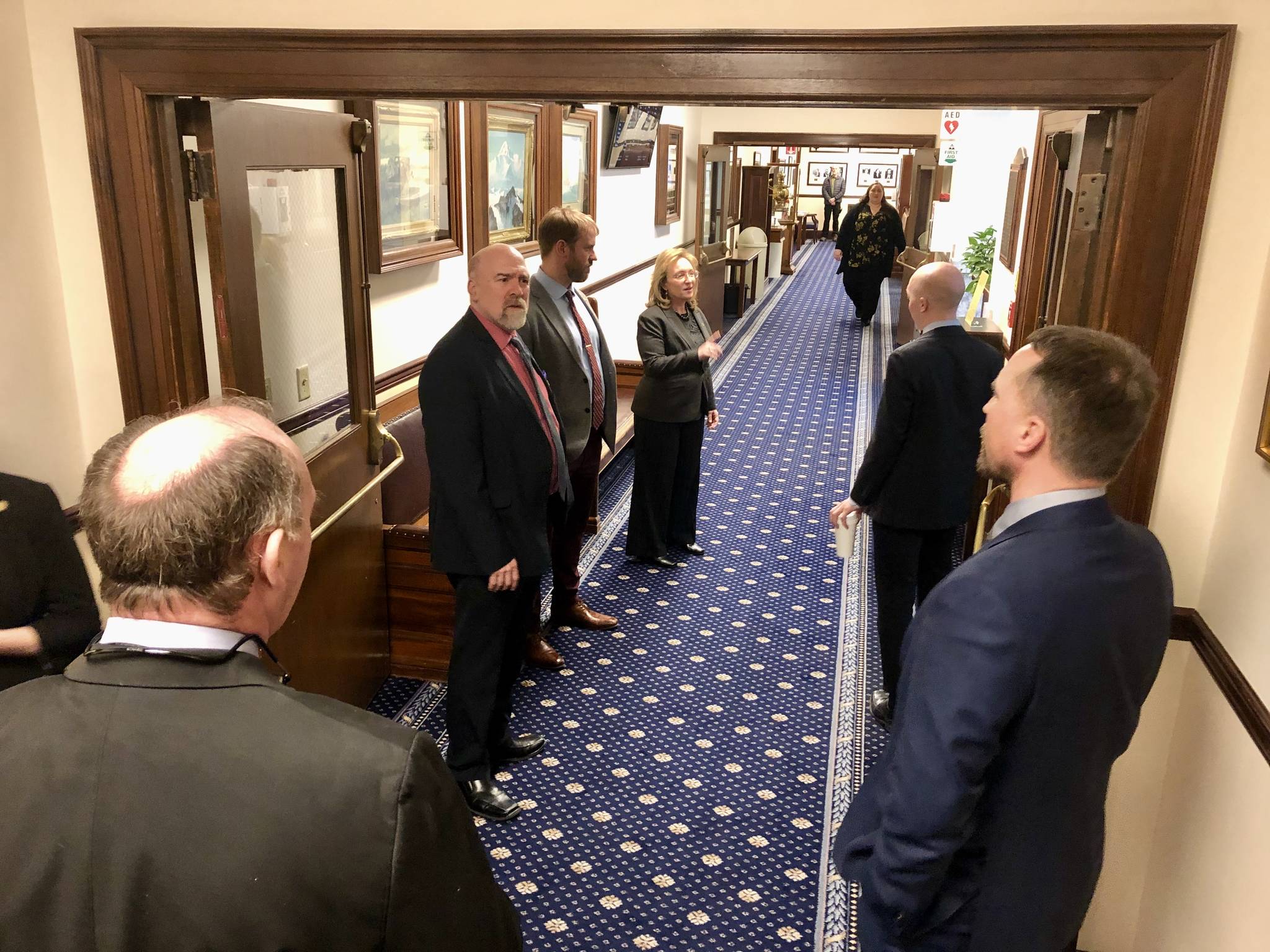 House representatives debate the supplemental budget bill in the halls of the Capitol on Wednesday March 25, 2020 (Peter Segall | Juneau Empire)