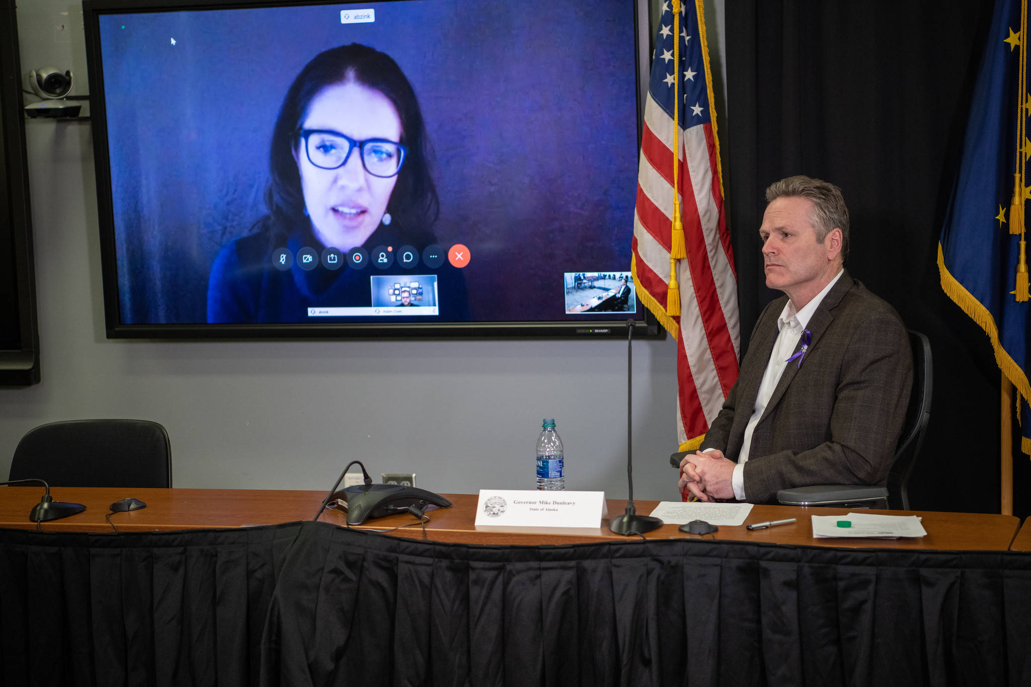 Gov. Mike Dunleavy at a press conference with Chief Medical Officer Dr. Anne Zink on Friday, March 27, 2020. (Courtesy photo | Office of Gov. Mike Dunleavy)