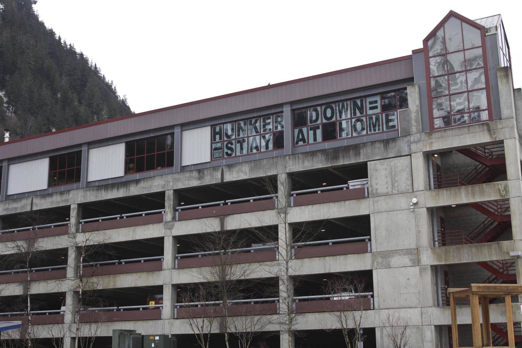 Michael S. Lockett | Juneau Empire                                 A message in the windows of the Downtown Public Library seen Tuesday encourages Juneauites to stay home during the coronavirus crisis. While at home, more patrons than usual are using Juneau Public Libraries’ e-services.