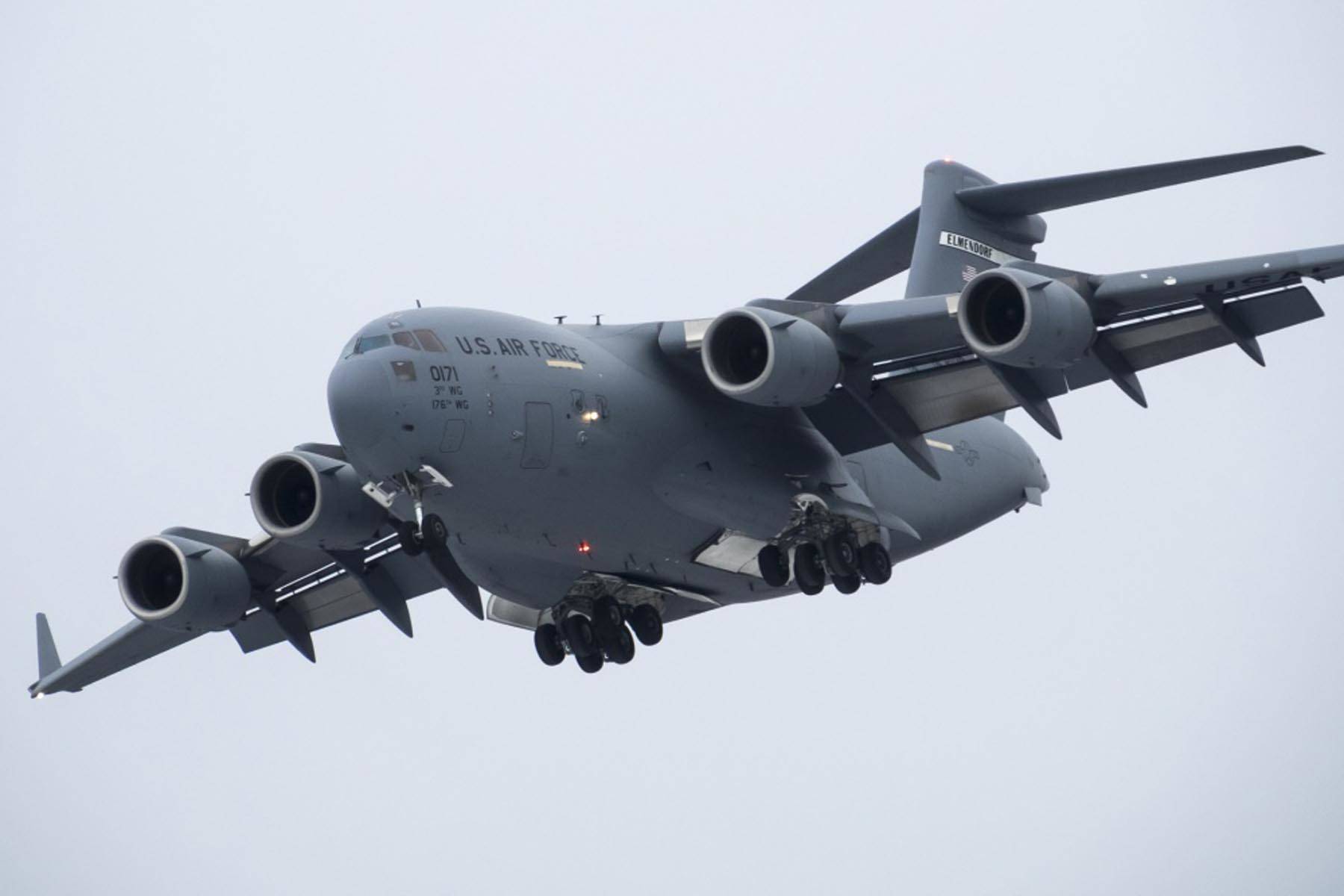 A C-17 Globemaster III aircraft of the 517th Airlift Squadron takes off from Bryant Army Airfield on Joint Base Elmendorf-Richardson, Alaska, Monday, March 7, 2016. C-17s from JBER will conduct a flyover of Juneau on May 15, 2020, to celebrate first responders. (U.S. Air Force | Justin Connaher)