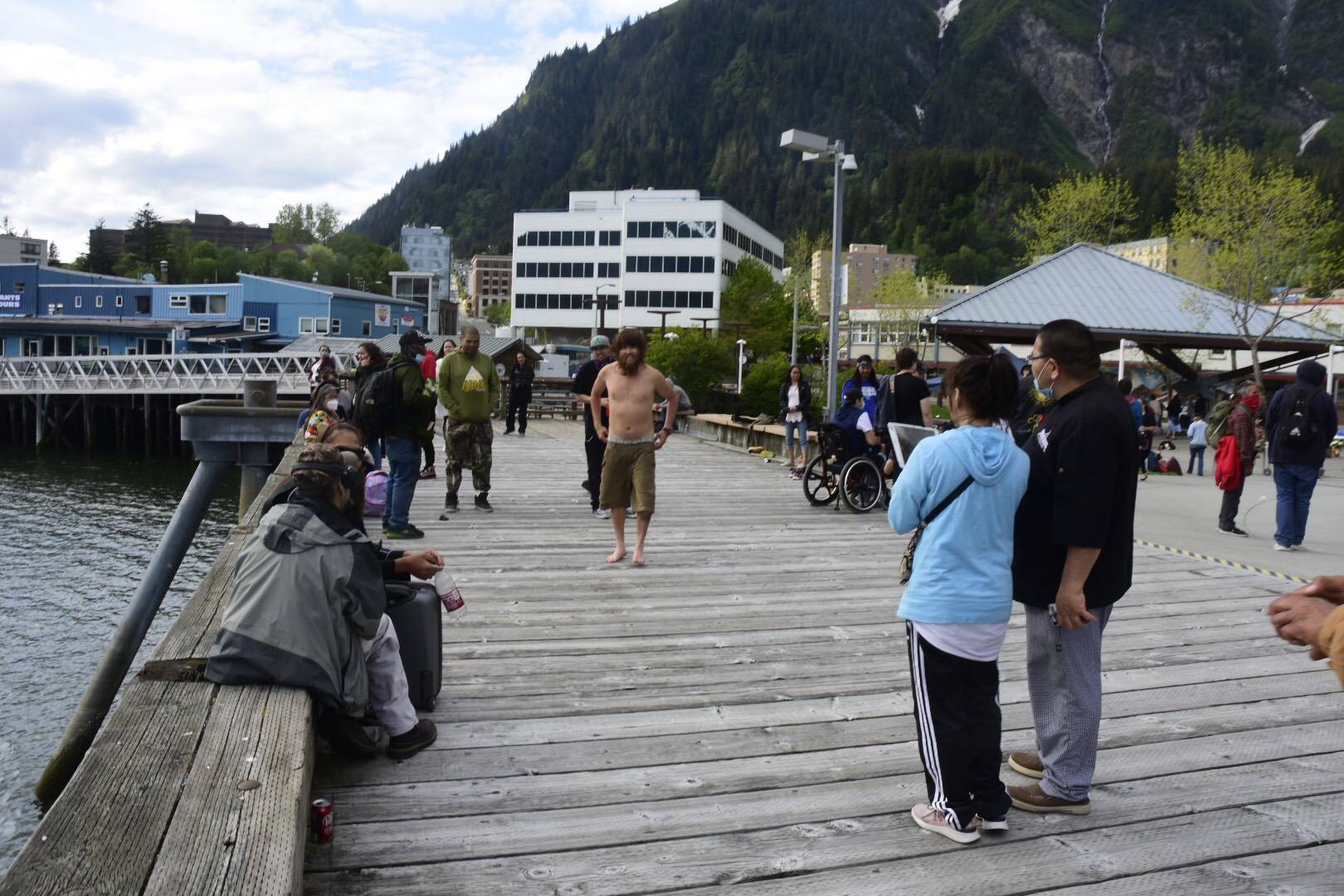 Juneauites take in the sun downtown on Friday, May 22, 2020. For the foreseeable future, locals will be the main source of revenue for businesses that typically rely on tourism money. That’s among financial concerns raised by the coronavirus, city officials said. (Peter Segall | Juneau Empire)