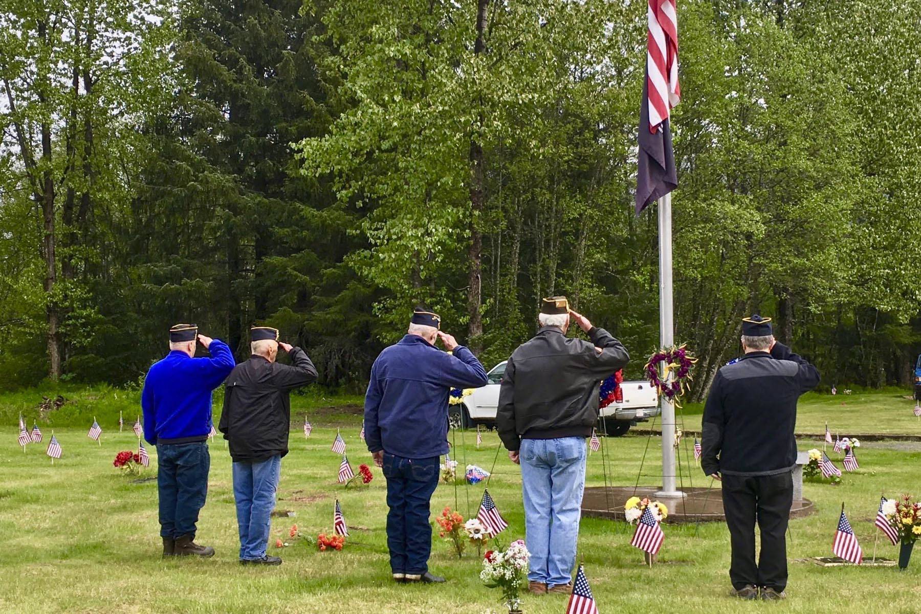 Members of the American Legion Post in Juneau salute after laying wreaths in the Alaska Memorial Park on Memorial Day, May 25, 2020. (Courtesy photo | Susan Clutton)
