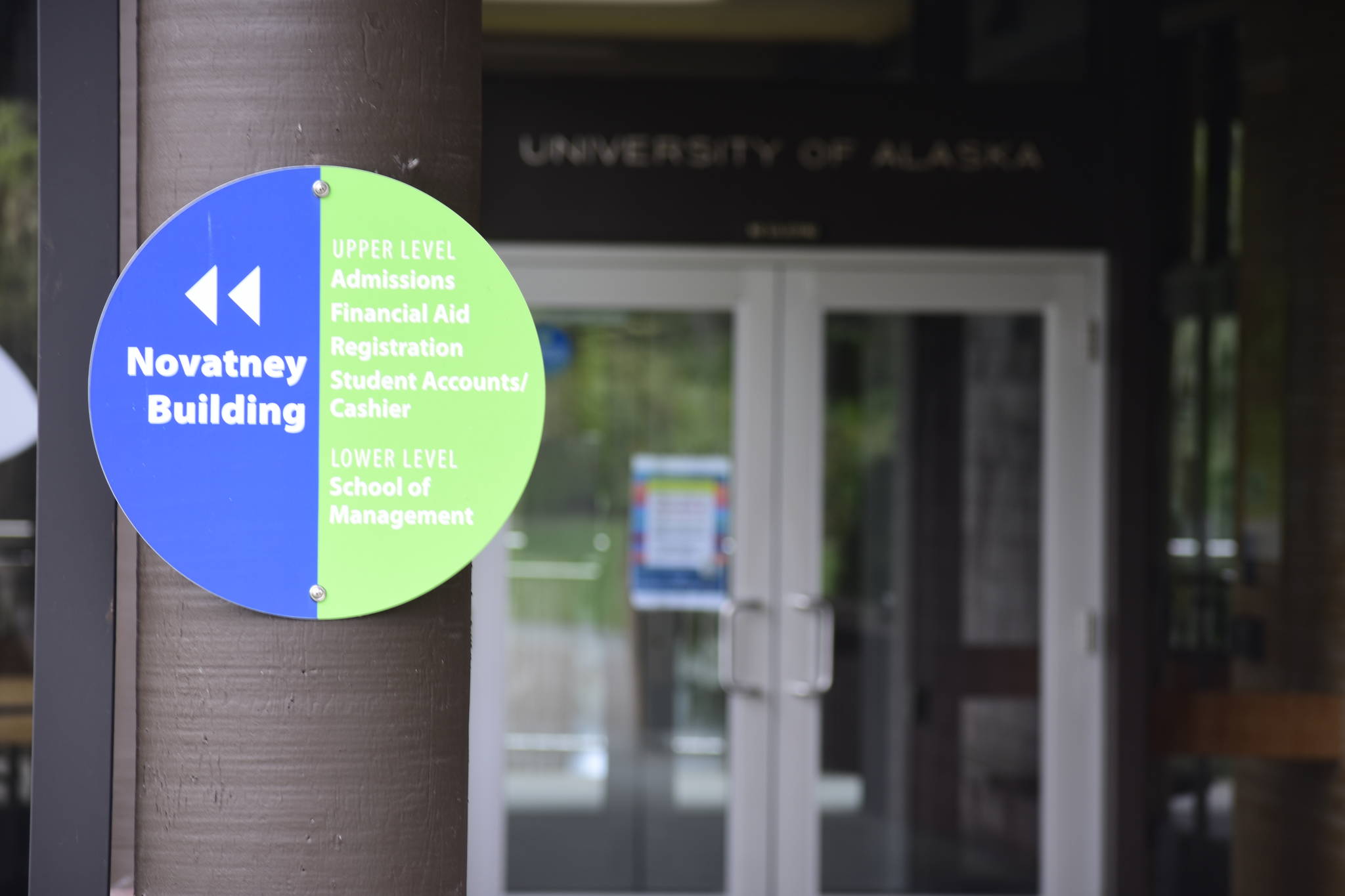 A sign on the University of Alaska Southeast campus in Juneau. Under a proposal being put before the UA Board of Regents next week, UAS could be merged with one of the other two schools in the system. (Peter Segall | Juneau Empire)