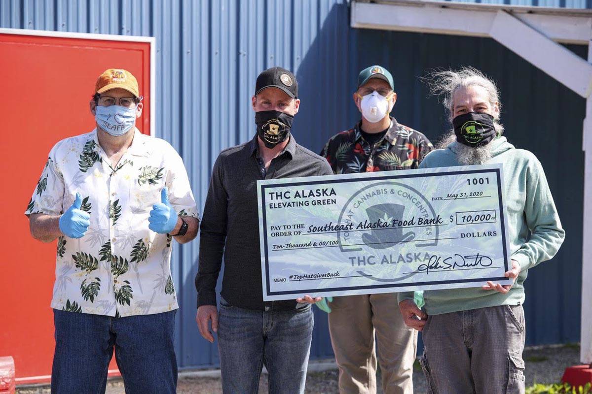 Members of Top Hat Cannabis pose with members of the Southeast Alaska Food Bank as they make a $10,000 donation to the food bank on Friday, May 29, 2020. (Courtesy photo | John Nemeth)